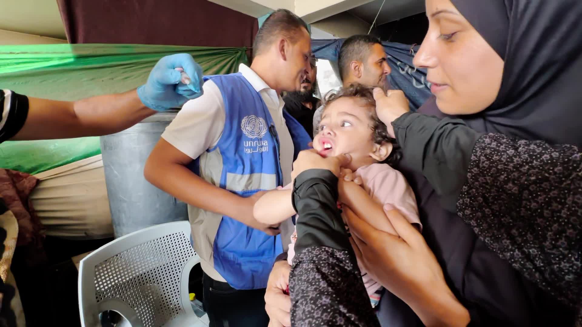 Palestinian Child Receives Polio Vaccination Amid Hamas-Israel Conflict