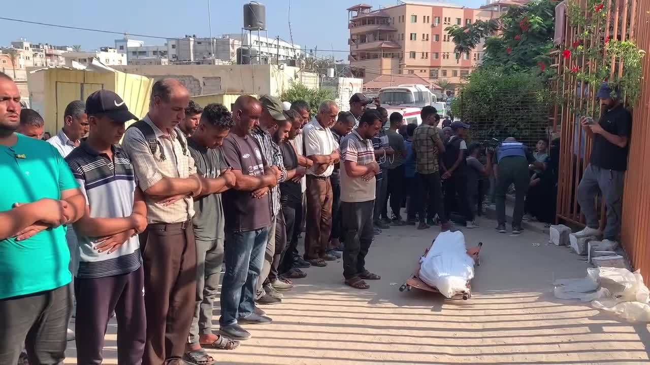 Mourners Gather at Nasser Hospital in Khan Younis to Pray for Victim of Israeli Strike Amid Israel-Hamas Conflict