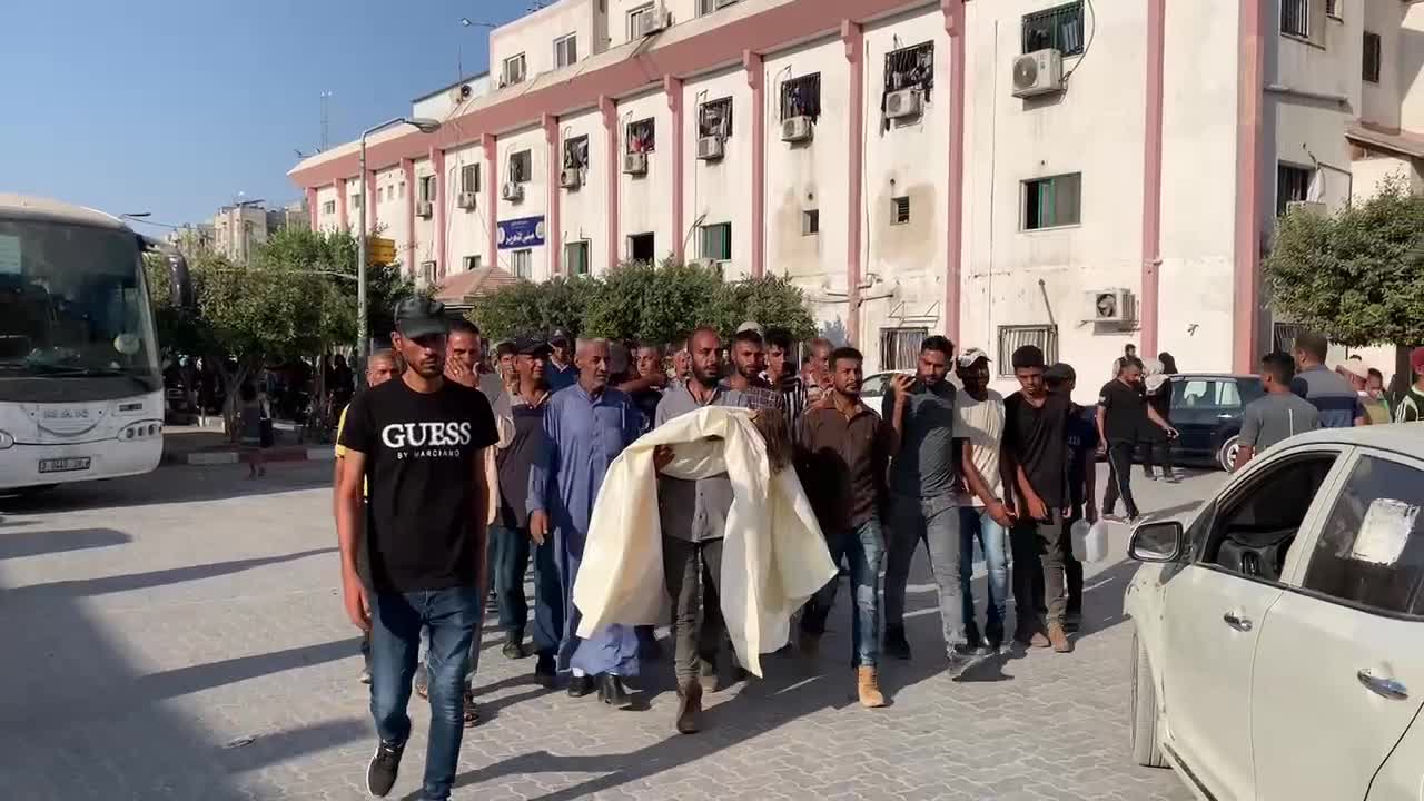 Mourners Gather at Nasser Hospital in Khan Younis to Pray for Victim of Israeli Strike Amid Israel-Hamas Conflict