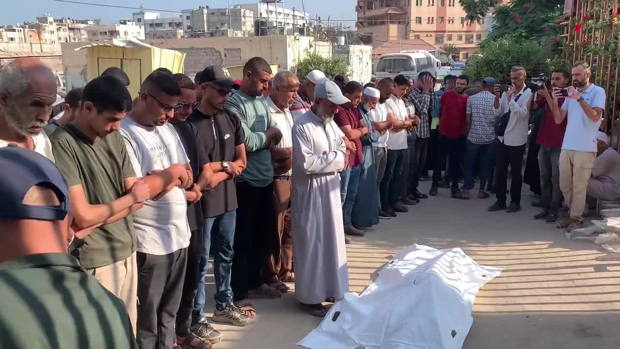 Mourners Gather at Nasser Hospital in Khan Younis to Pray for Victim of Israeli Strike Amid Israel-Hamas Conflict