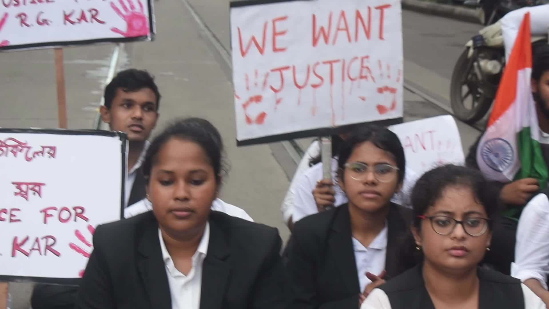 Law students give slogans protesting over the sexual assault and murder of a postgraduate woman doctor in Kolkata, India