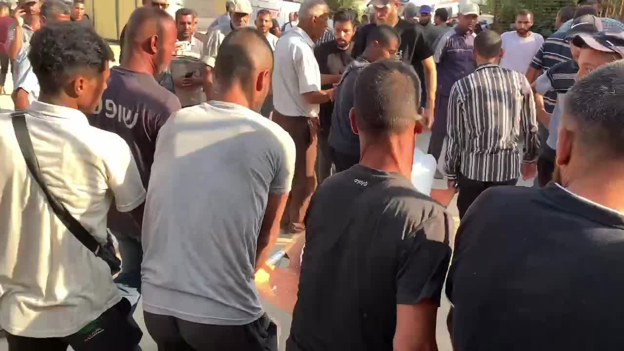 Mourners Gather at Nasser Hospital in Khan Younis to Pray for Victim of Israeli Strike Amid Israel-Hamas Conflict