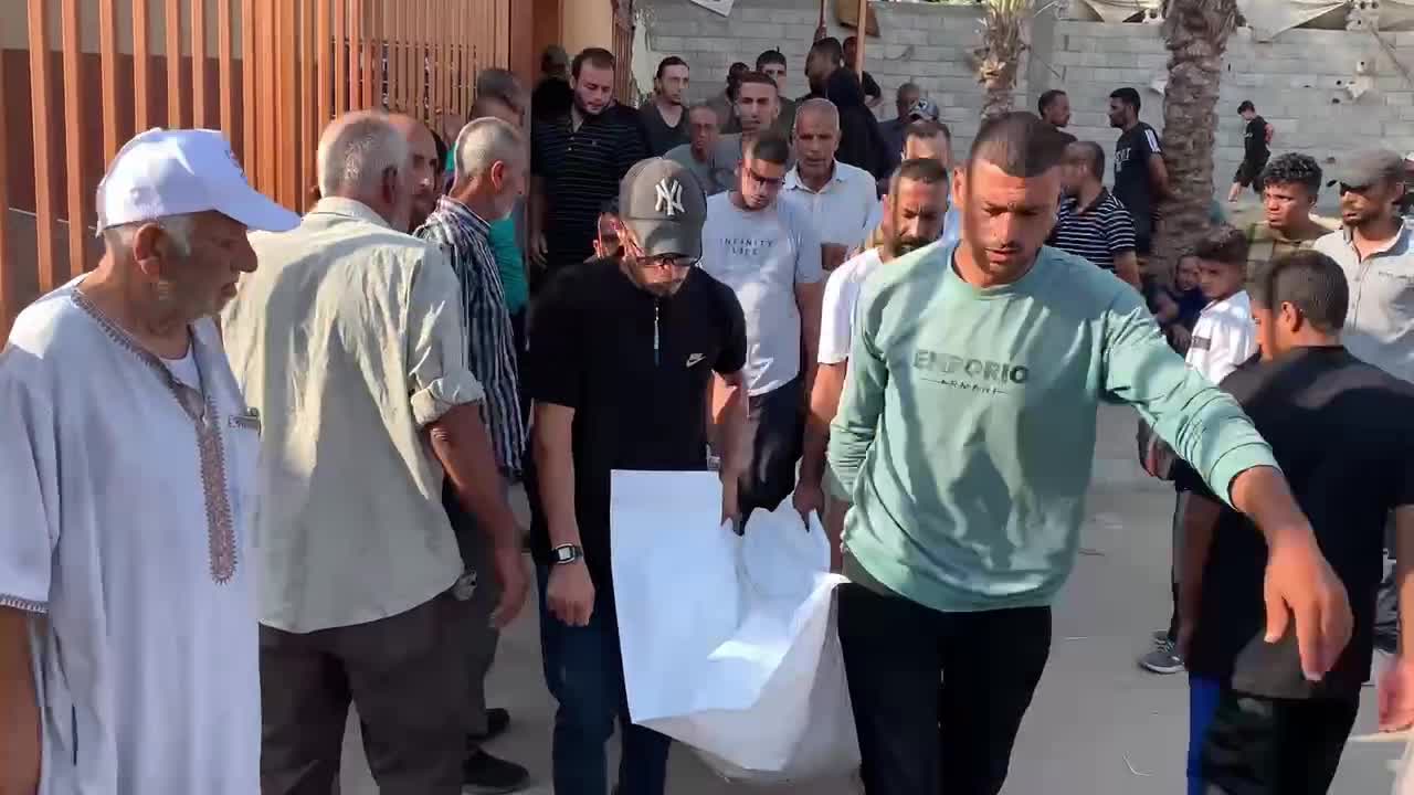 Mourners Gather at Nasser Hospital in Khan Younis to Pray for Victim of Israeli Strike Amid Israel-Hamas Conflict