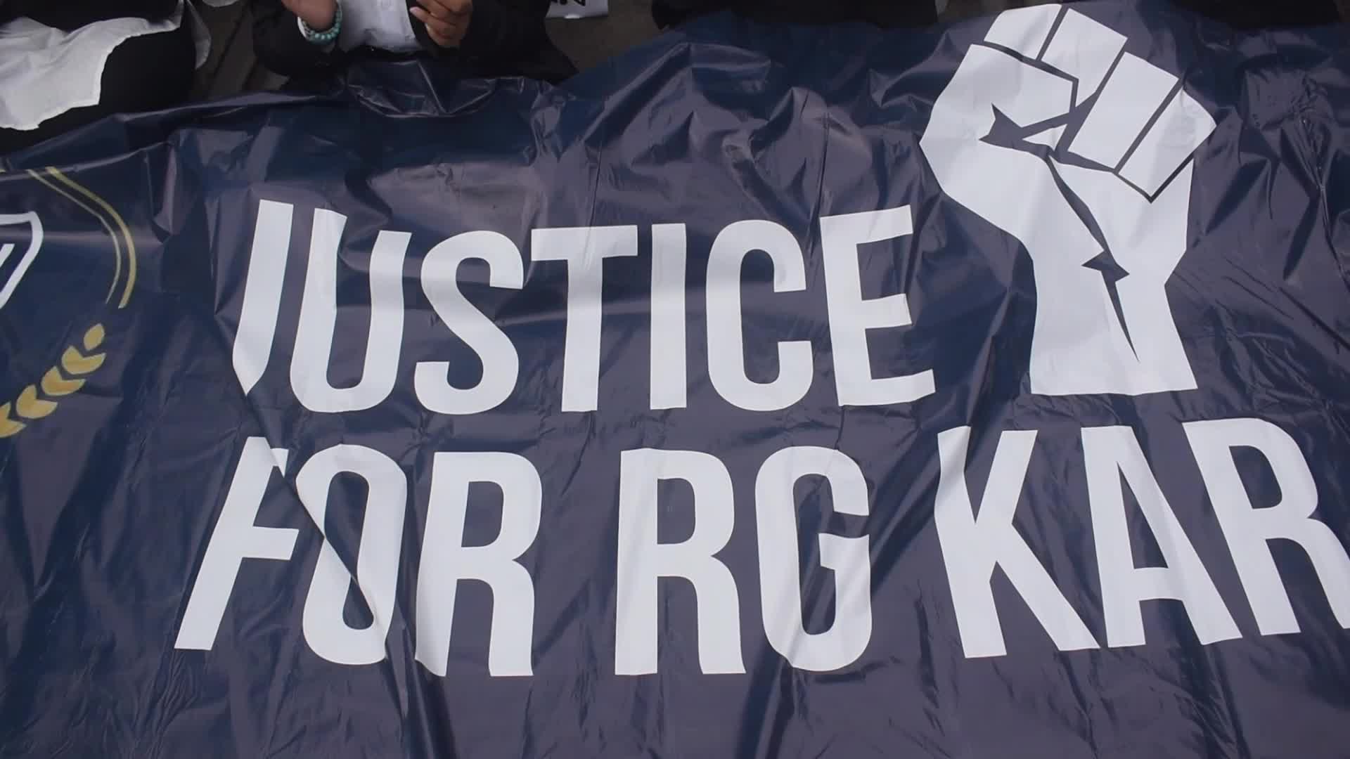 Law students give slogans protesting over the sexual assault and murder of a postgraduate woman doctor in Kolkata, India