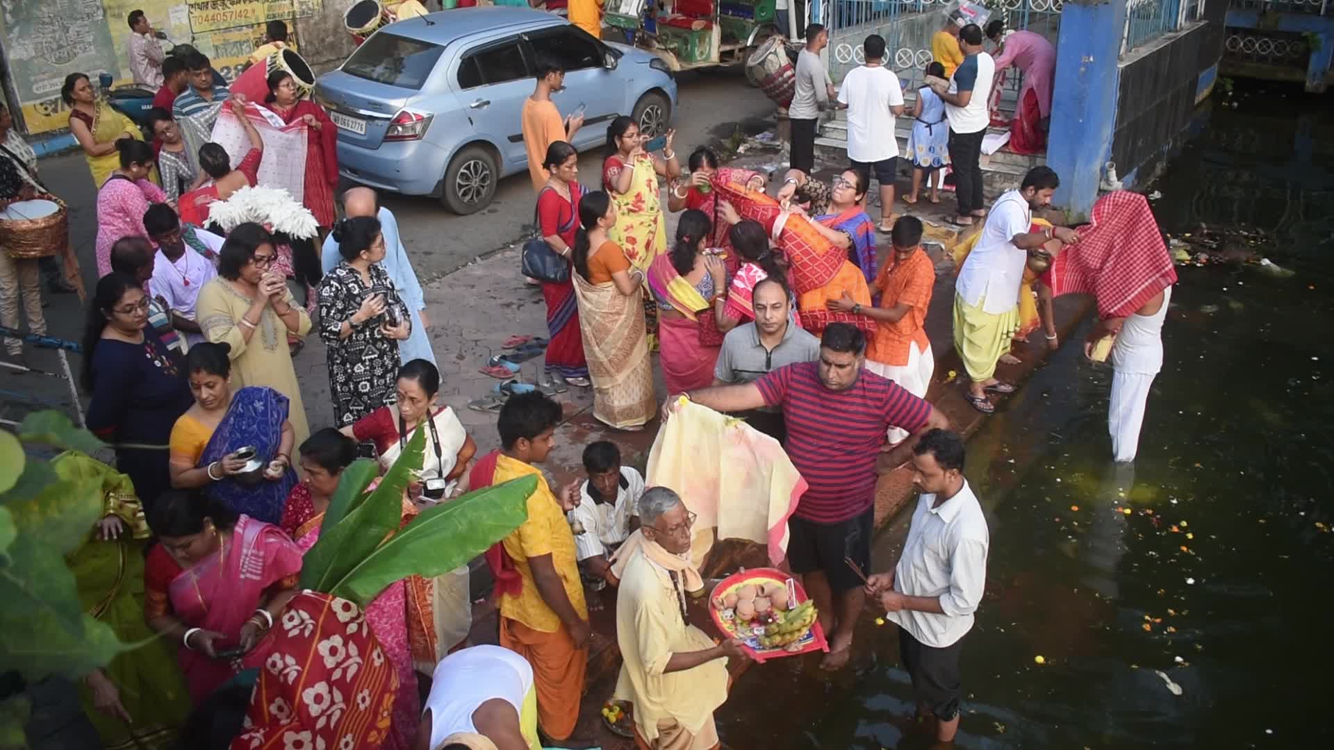 Devotees performing Nabapatrika ritual on the occasion of the Durga Puja festival in Kolkata, India