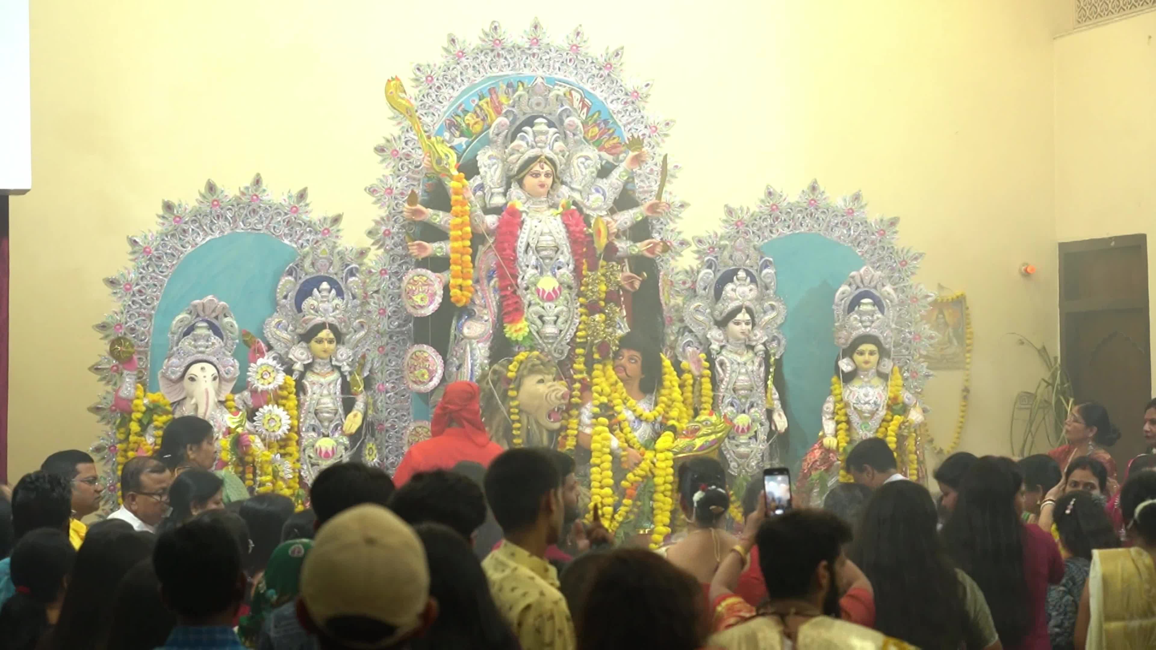Indian Devotees performs religious ritual in front of an idol of the goddess Durga during the 'Durga Puja' festival in Ajmer