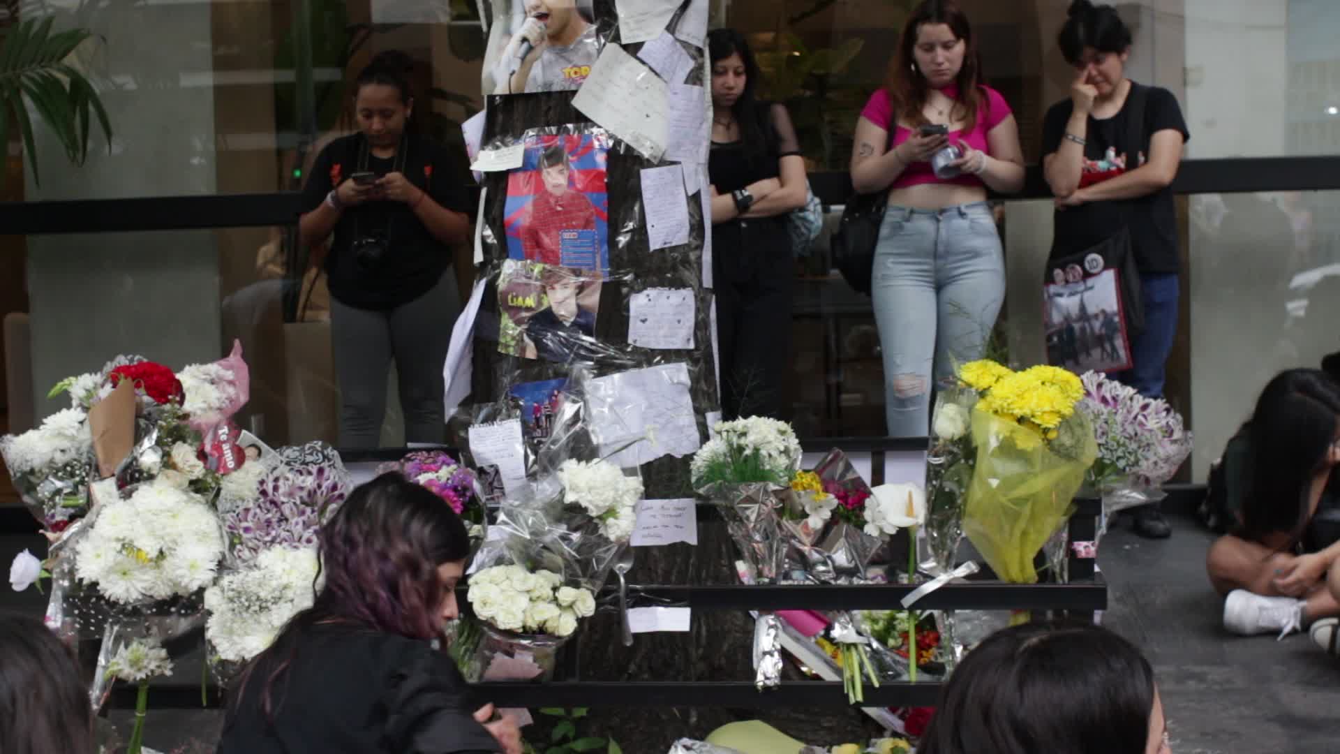 Fans continue to gather outside hotel where Liam Payne died in Buenos Aires
