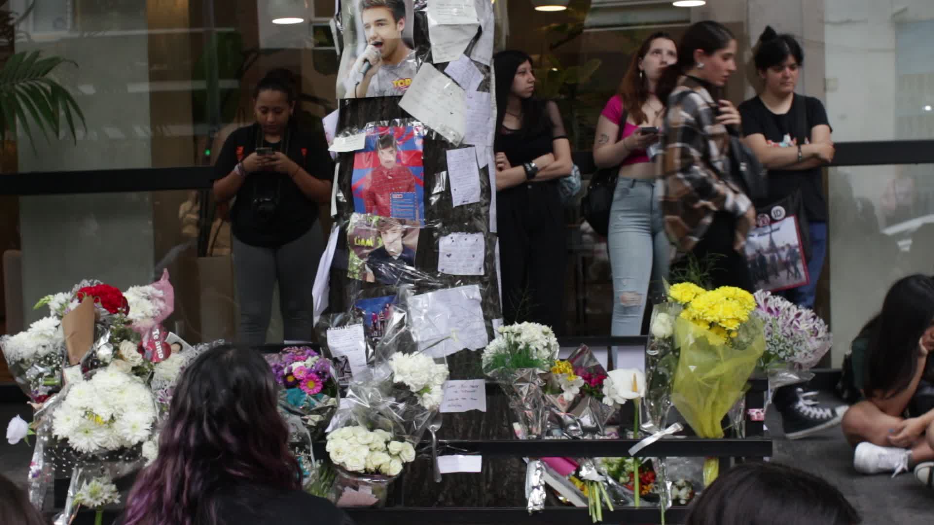 Fans continue to gather outside hotel where Liam Payne died in Buenos Aires