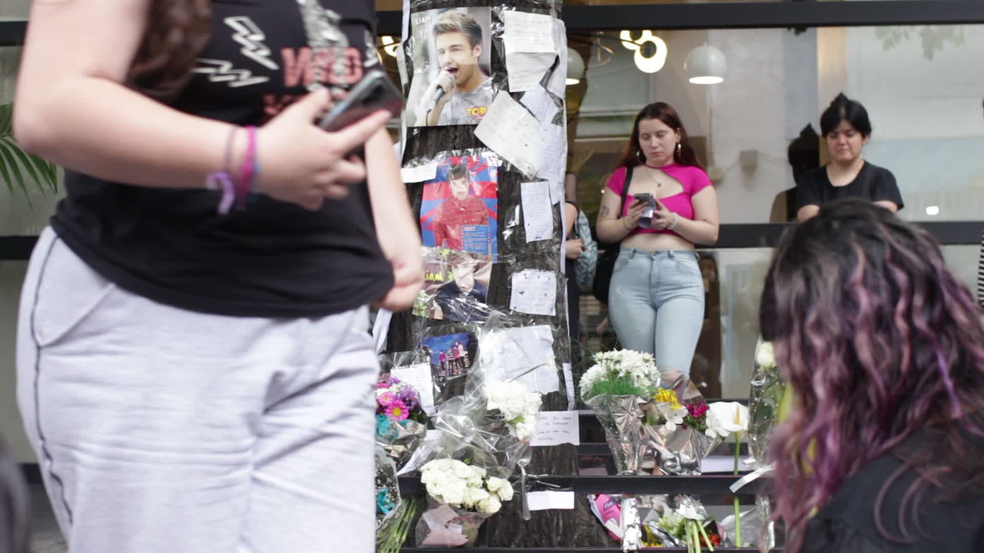 Fans continue to gather outside hotel where Liam Payne died in Buenos Aires