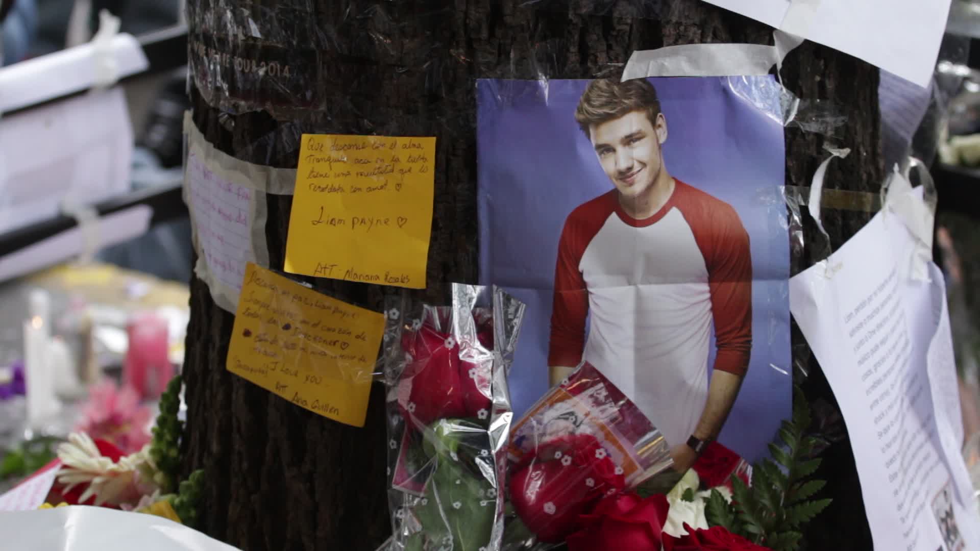 Fans continue to gather outside hotel where Liam Payne died in Buenos Aires