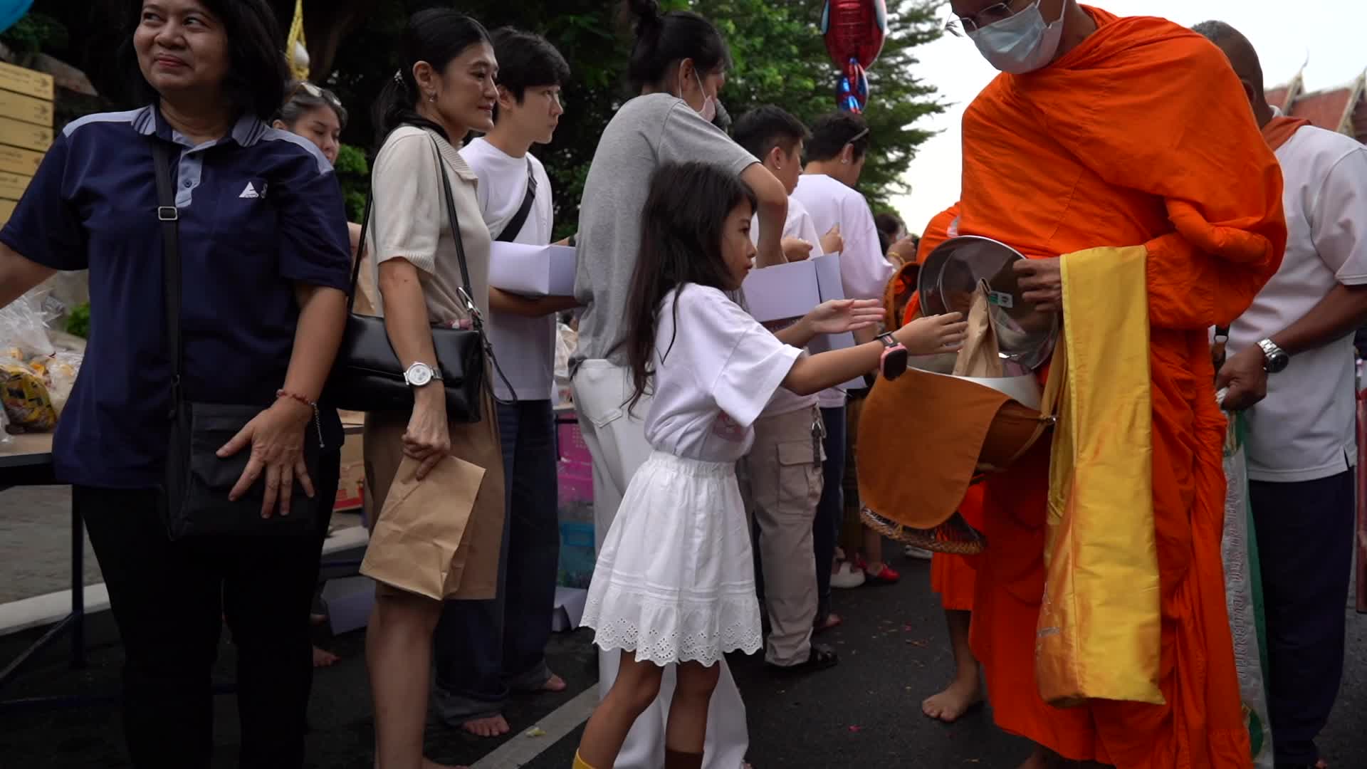 Thai faithful mark the end of the Buddhist Lent in Bangkok.