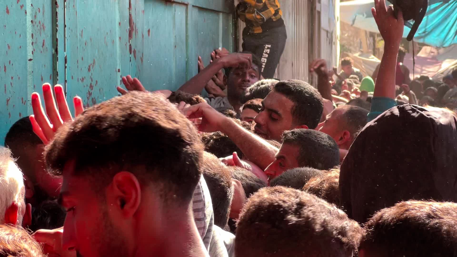 Palestinians Queue for Bread in Khan Yunis Amid Gaza Conflict