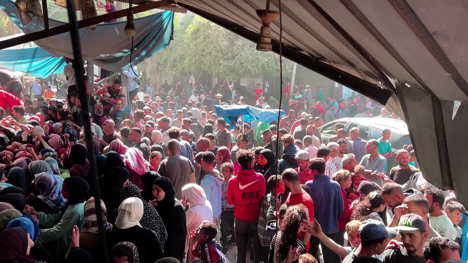 Palestinians Queue for Bread in Khan Yunis Amid Gaza Conflict