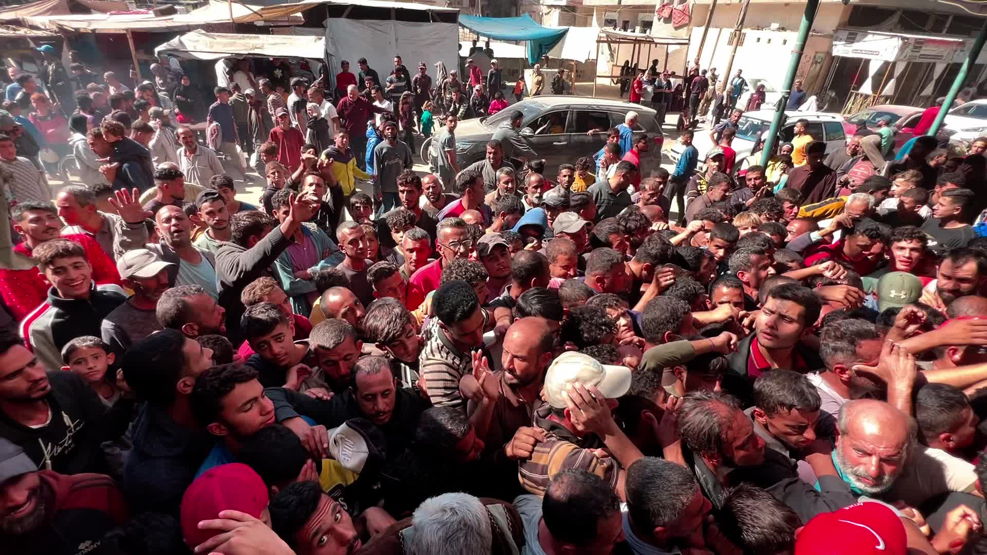 Palestinians Queue for Bread in Khan Yunis Amid Gaza Conflict