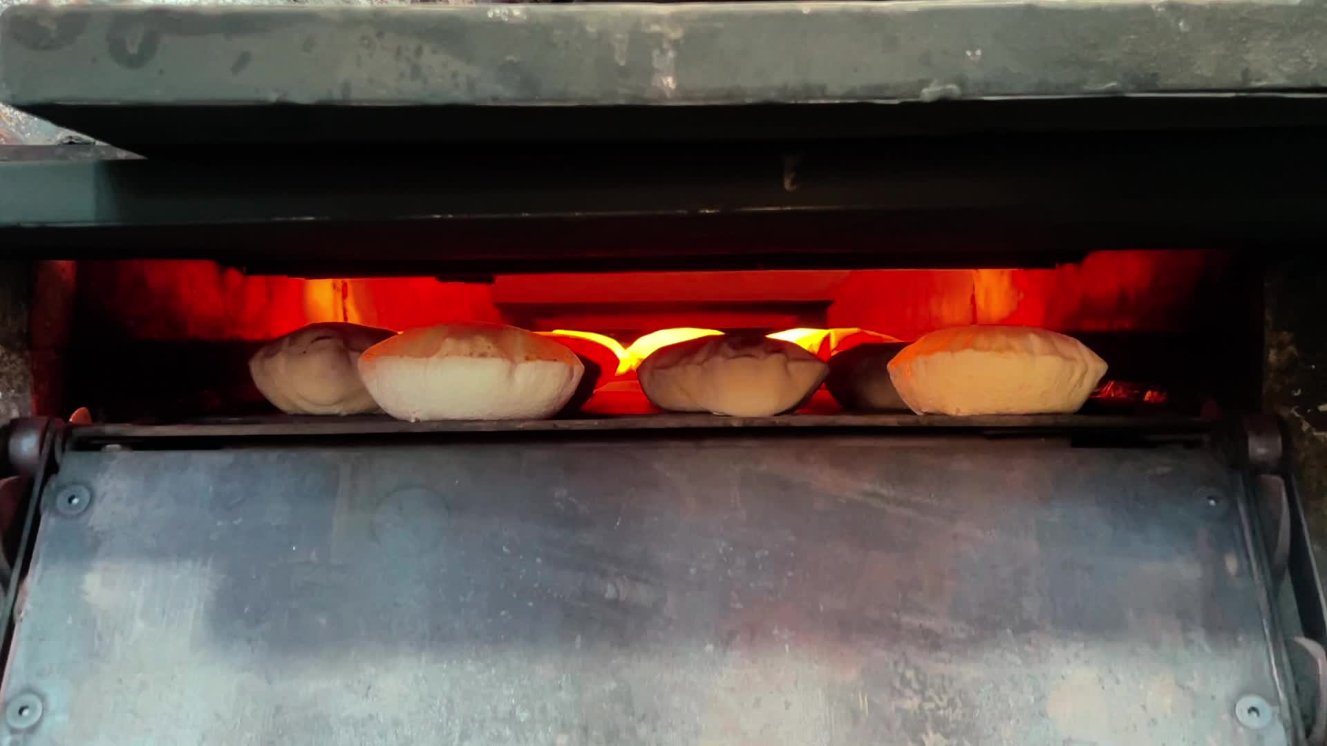 Palestinians Queue for Bread in Khan Yunis Amid Gaza Conflict