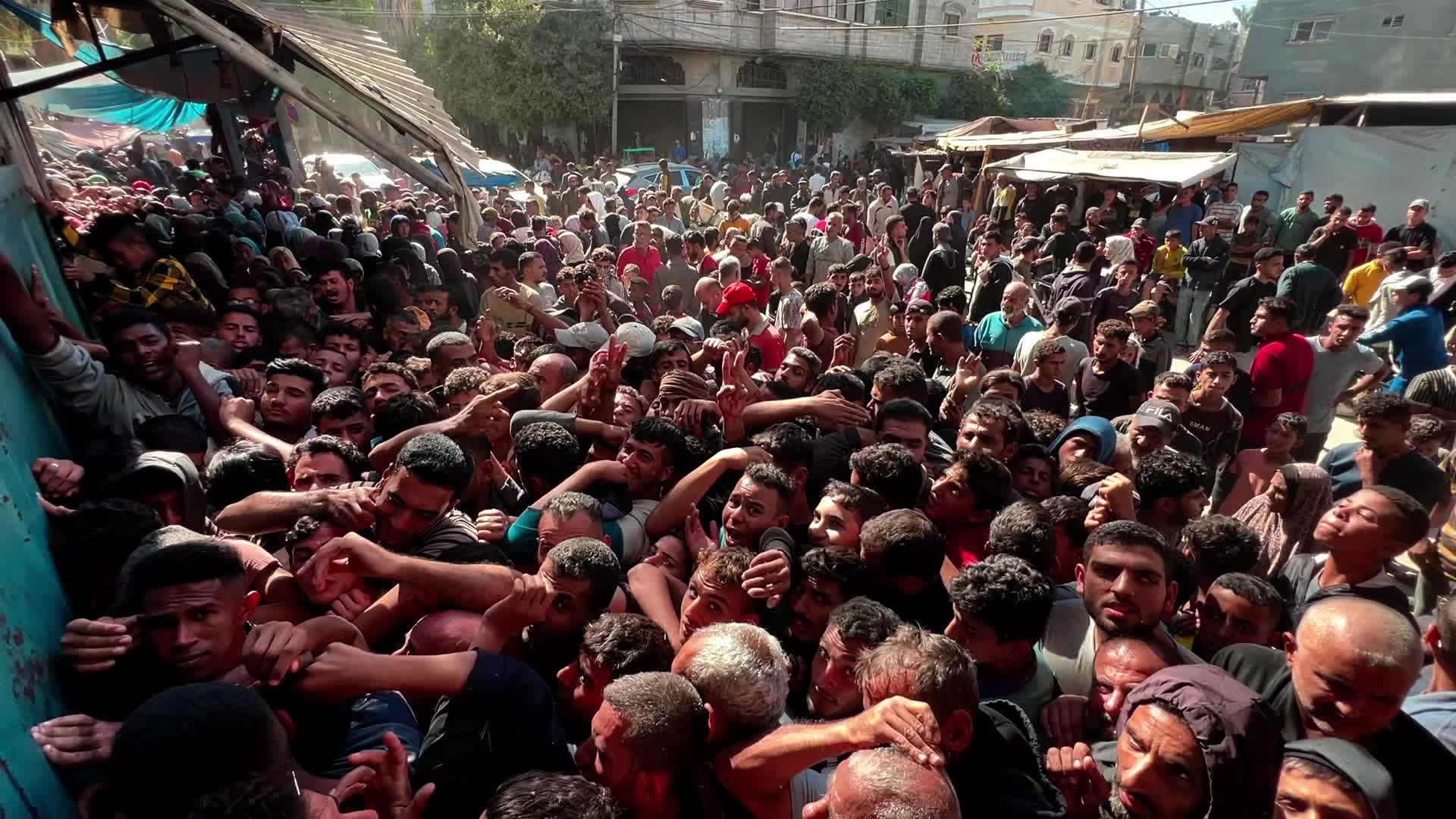 Palestinians Queue for Bread in Khan Yunis Amid Gaza Conflict