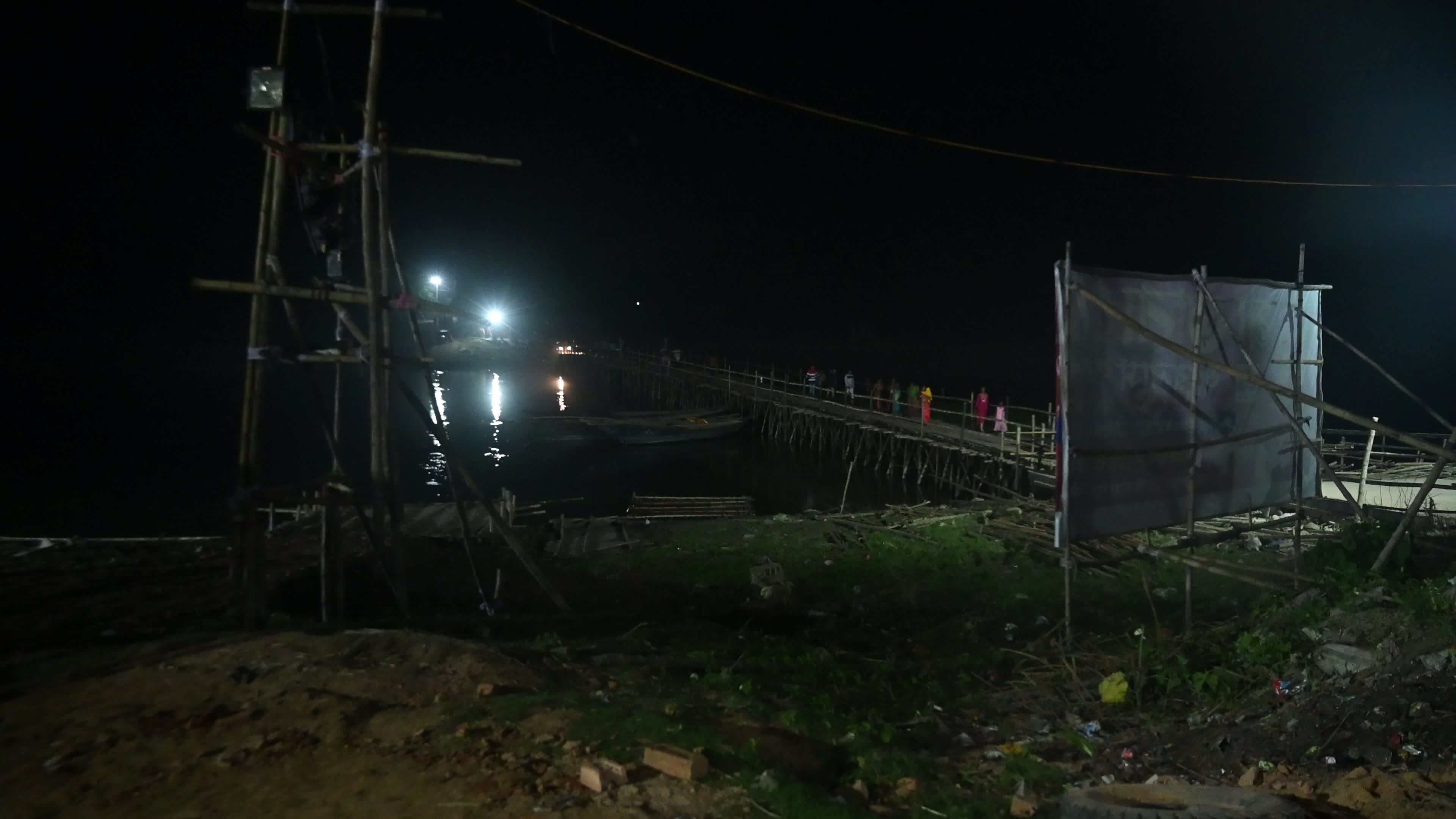 Village Scene at night on the bamboo bridge
