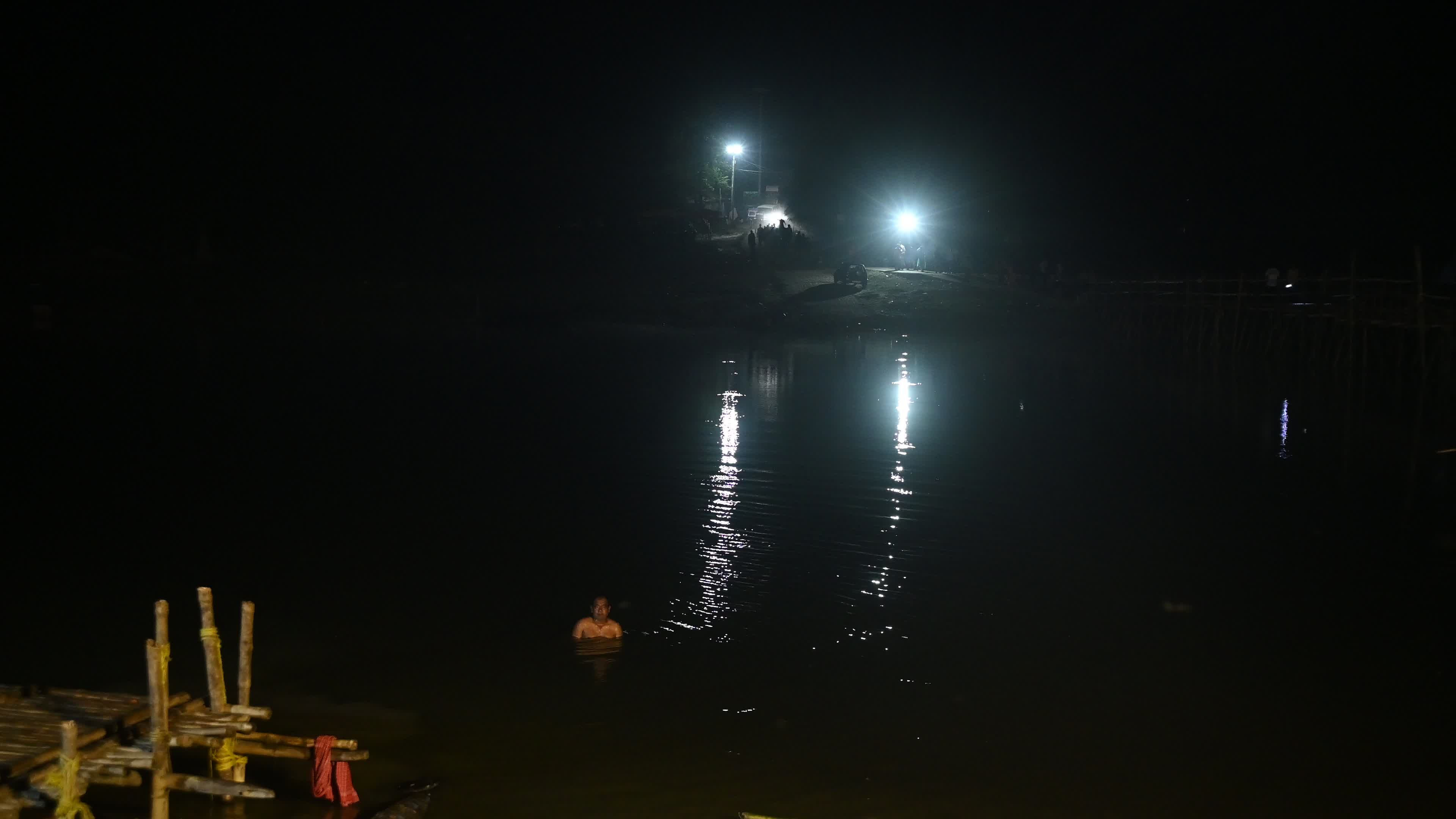 Village Scene at night on the bamboo bridge
