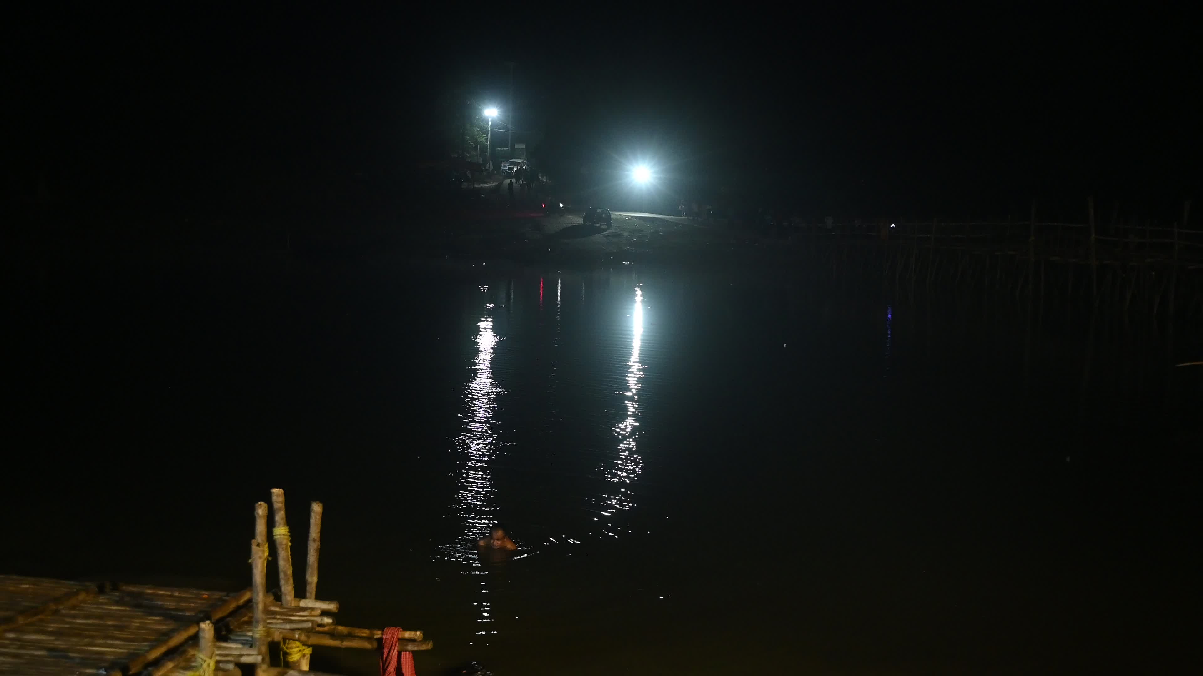 Village Scene at night on the bamboo bridge
