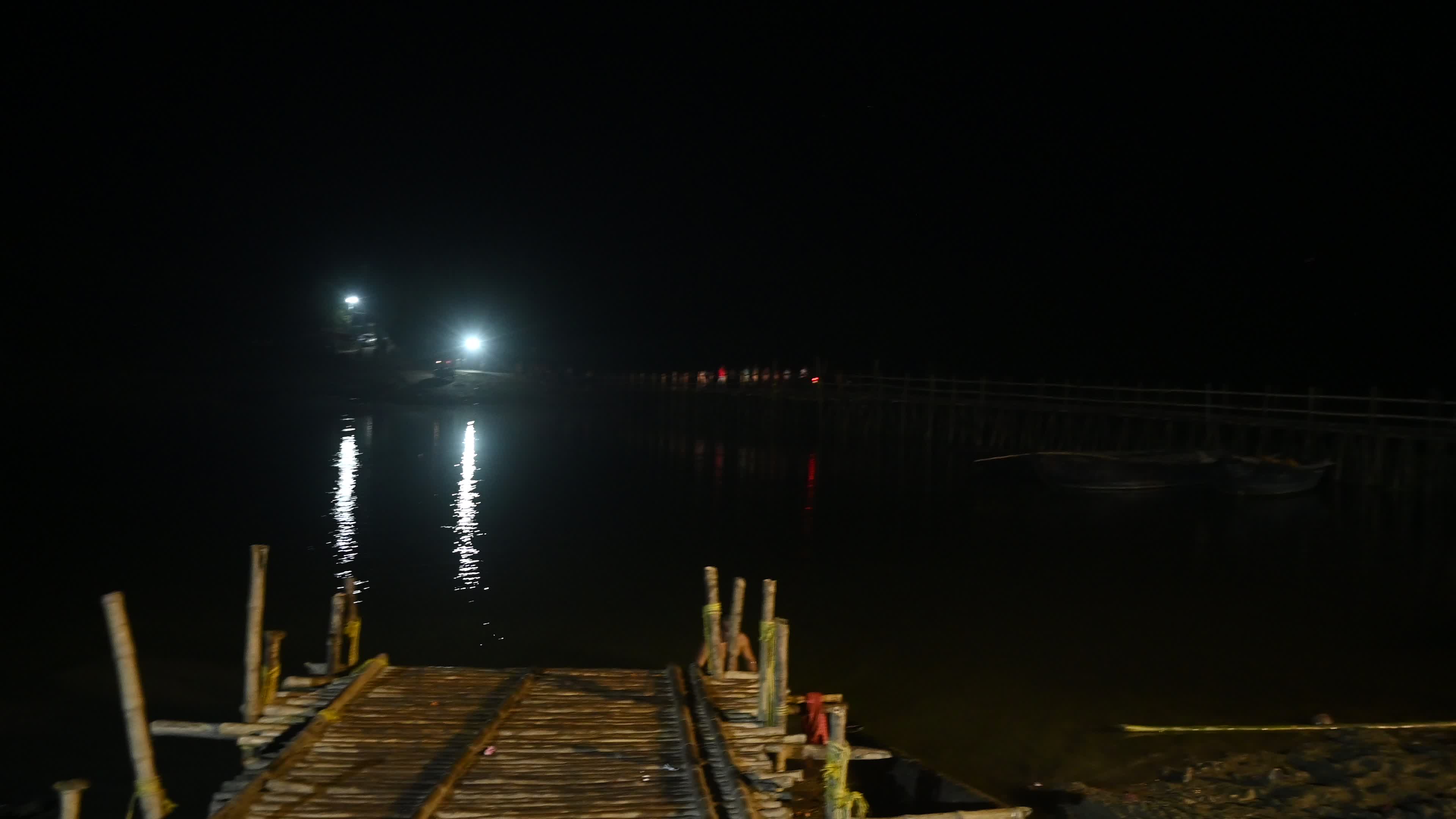 Village Scene at night on the bamboo bridge
