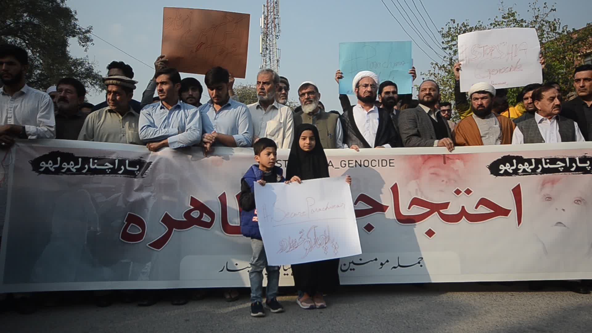 Shiite Muslims protest against attack on passenger vehicles that killed at least 40
