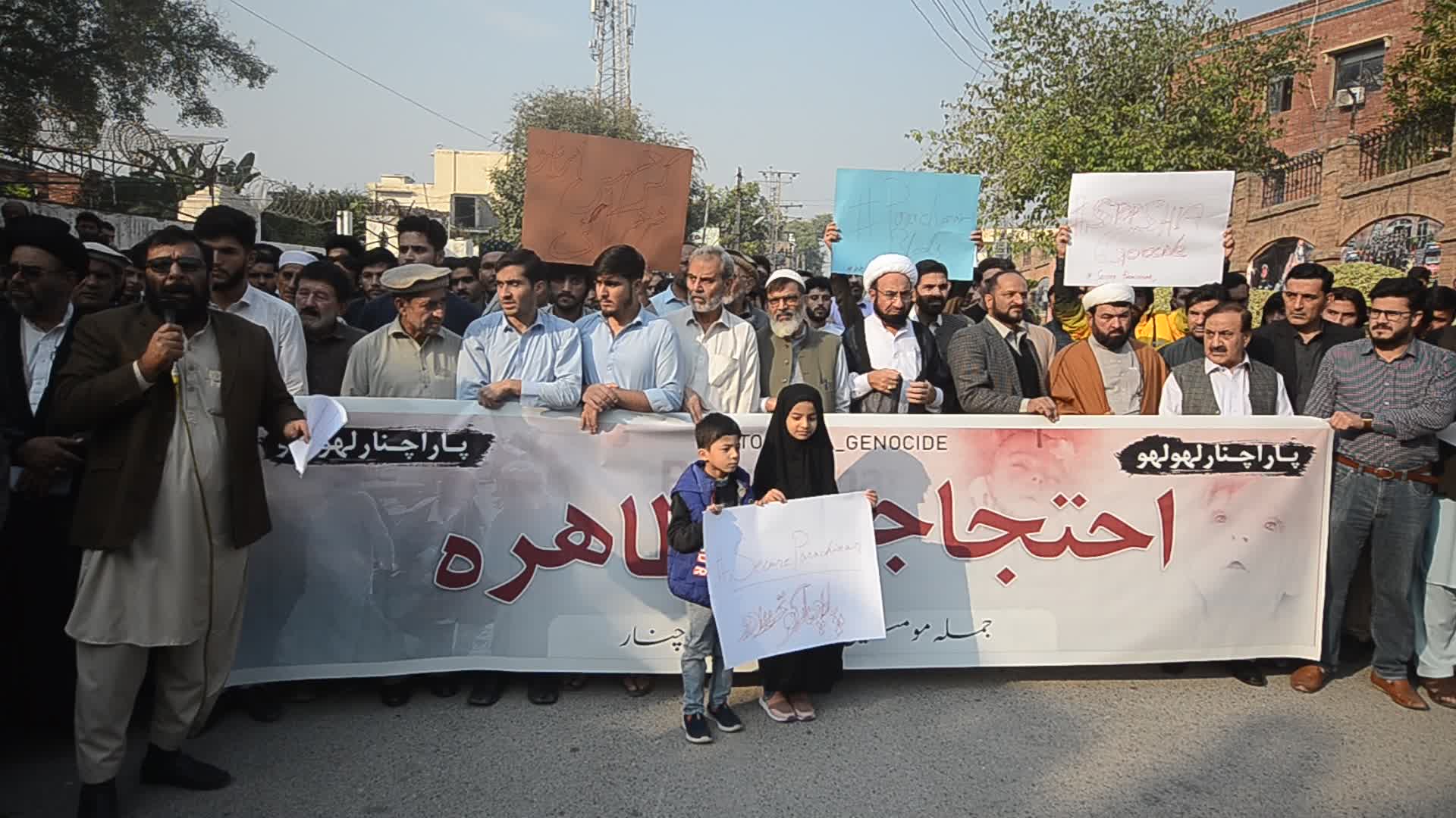 Shiite Muslims protest against attack on passenger vehicles that killed at least 40
