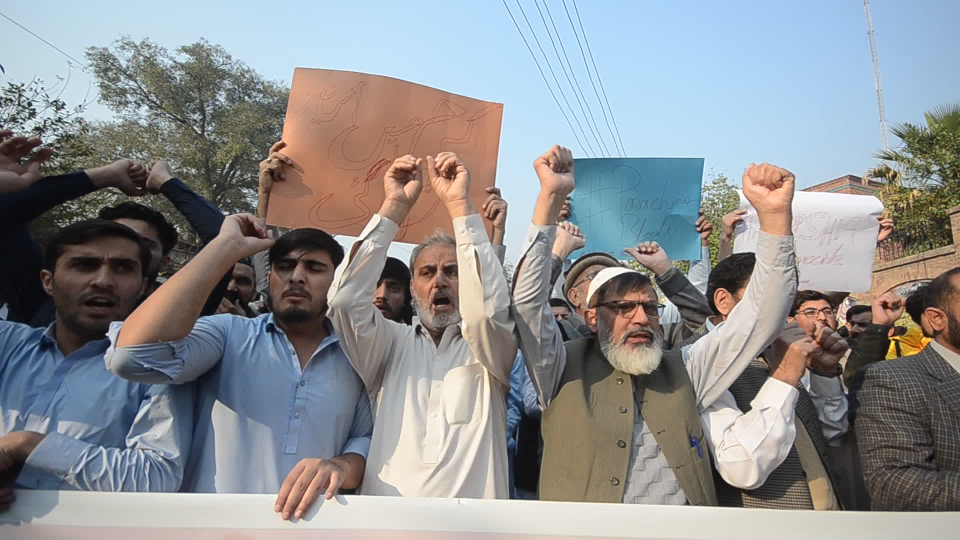 Shiite Muslims protest against attack on passenger vehicles that killed at least 40
