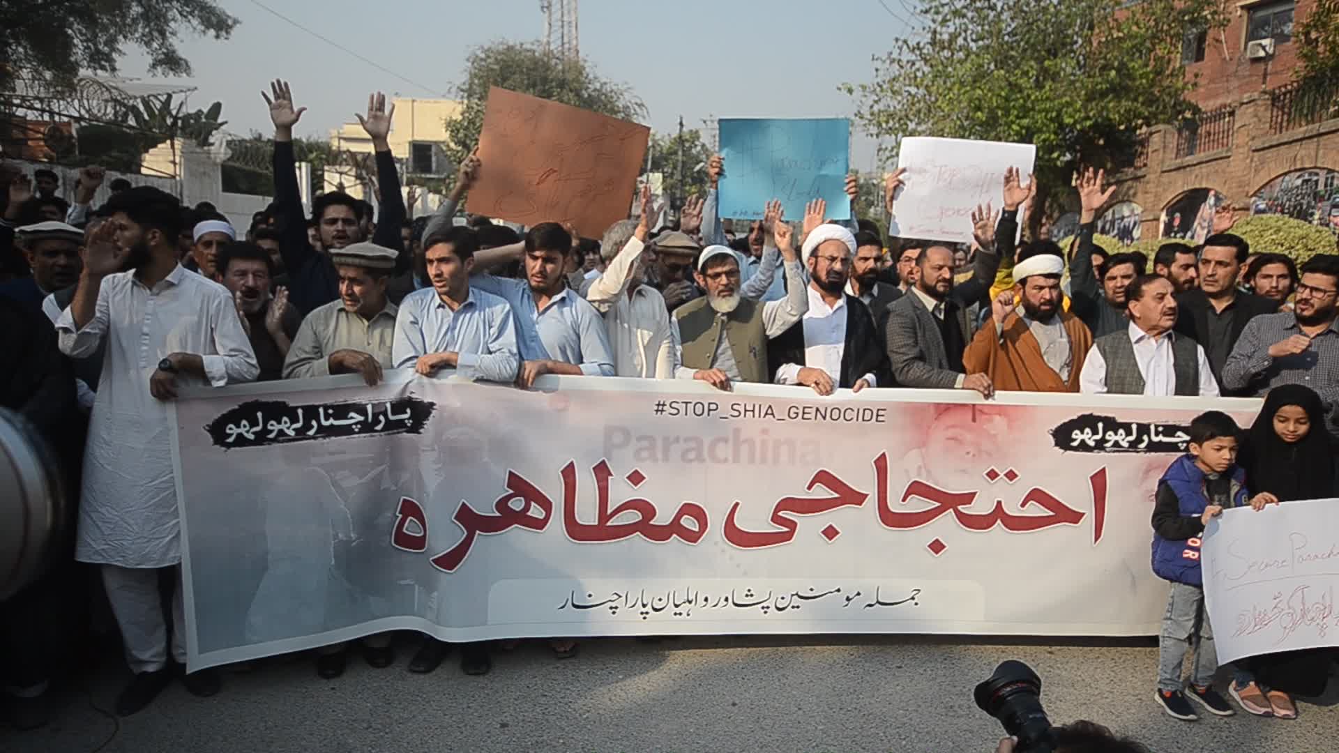 Shiite Muslims protest against attack on passenger vehicles that killed at least 40
