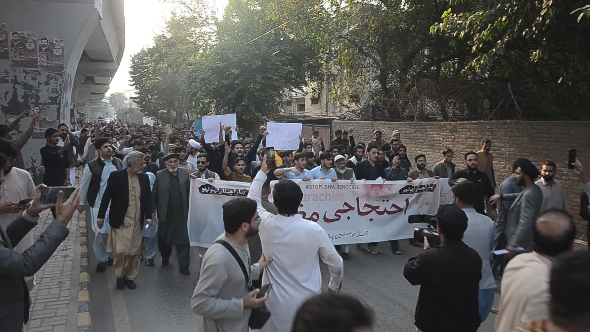 Shiite Muslims protest against attack on passenger vehicles that killed at least 40
