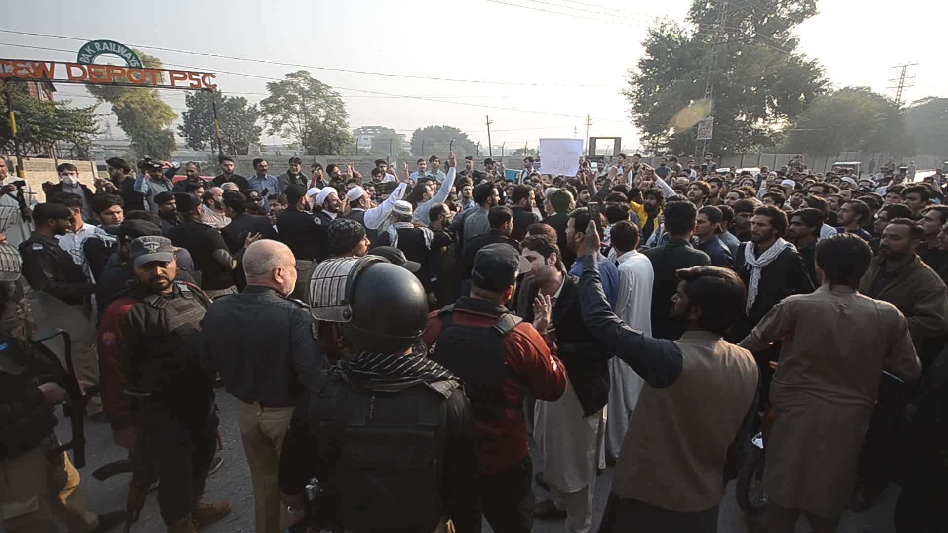 Shiite Muslims protest against attack on passenger vehicles that killed at least 40
