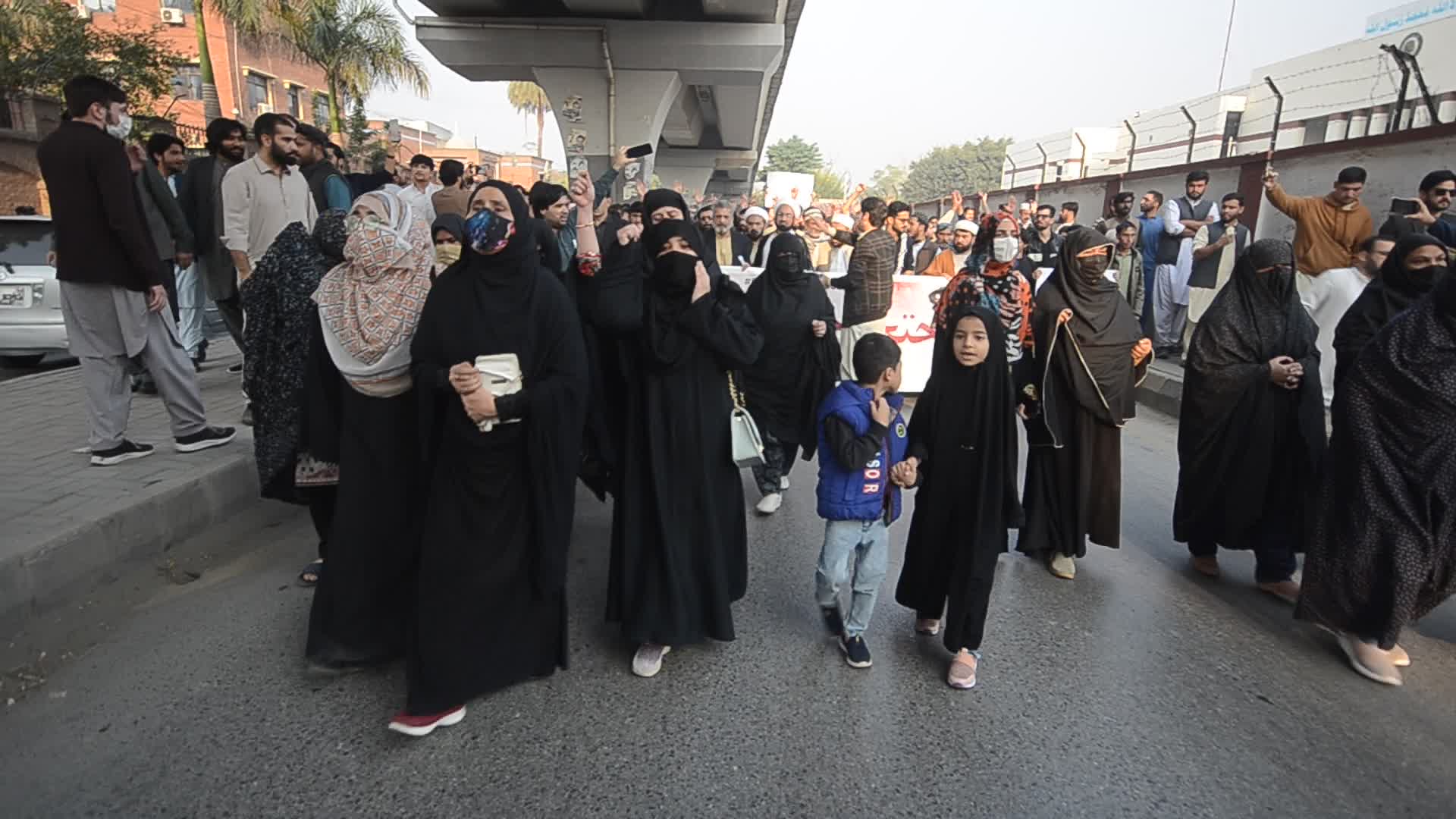 Shiite Muslims protest against attack on passenger vehicles that killed at least 40

