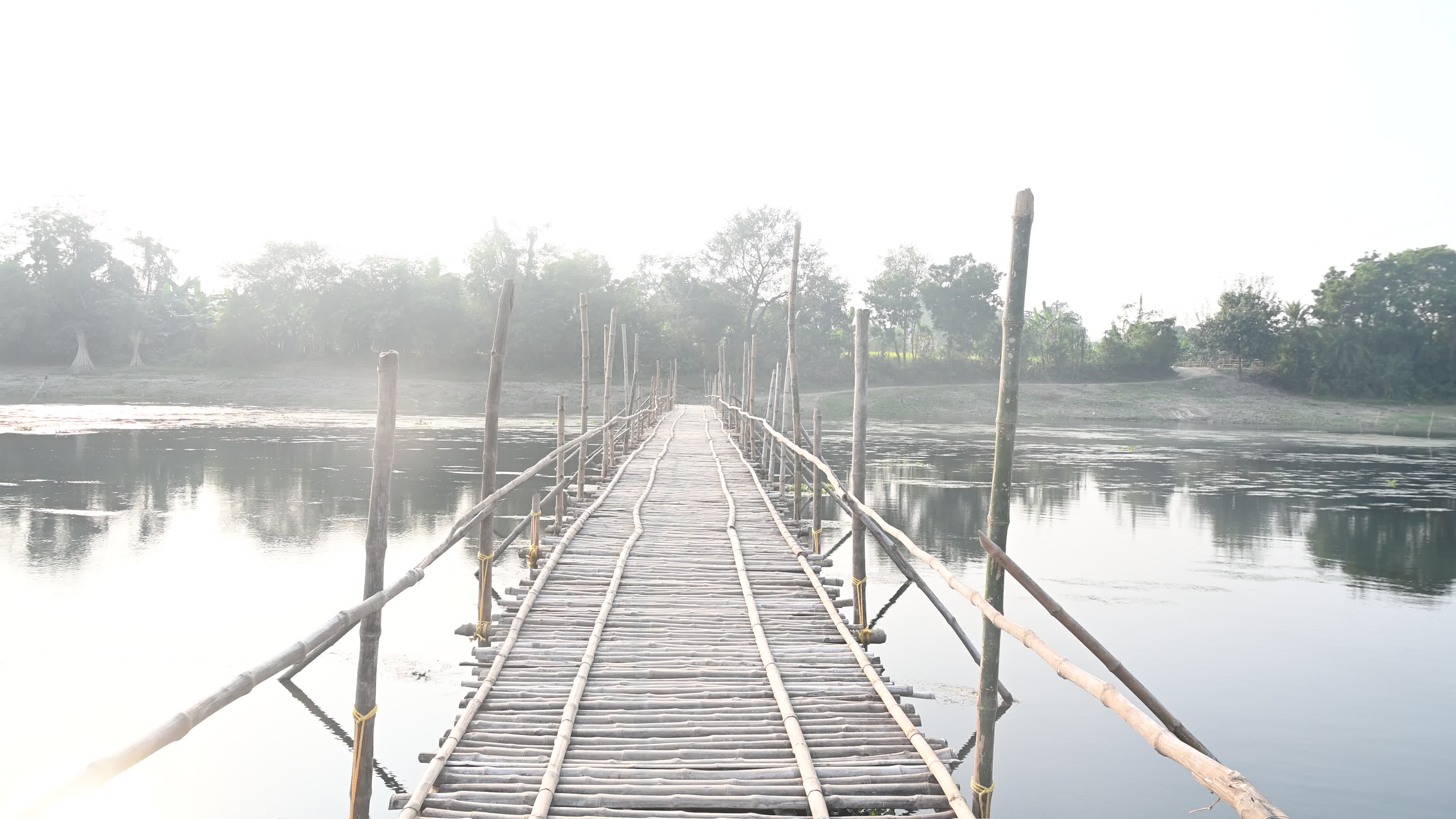 Long Bamboo Bridge Across A River
