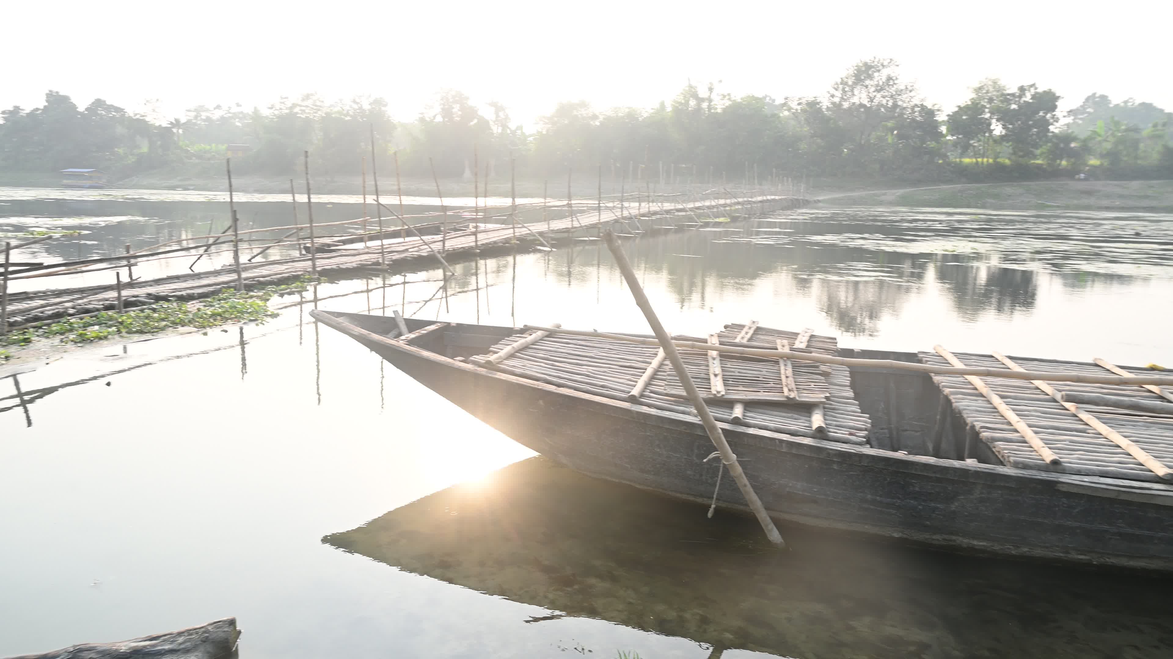 Long Bamboo Bridge Across A River
