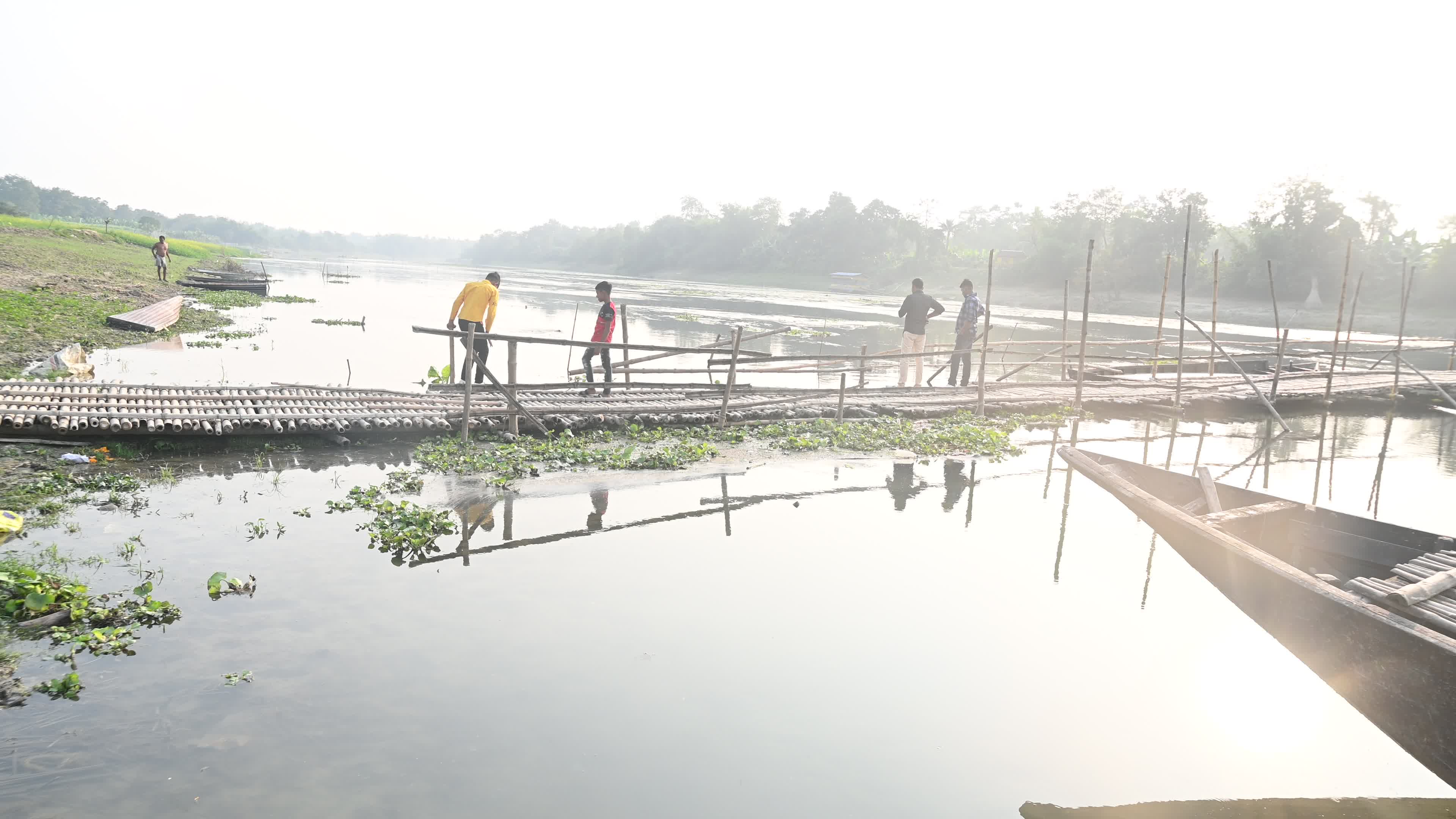 Long Bamboo Bridge Across A River
