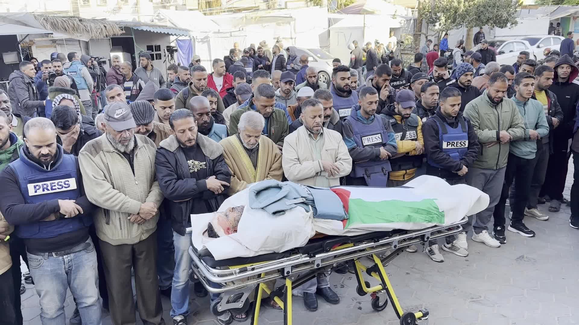 Mourners Gather at Funeral of Al Jazeera Journalist Ahmed Al-Louh in Gaza