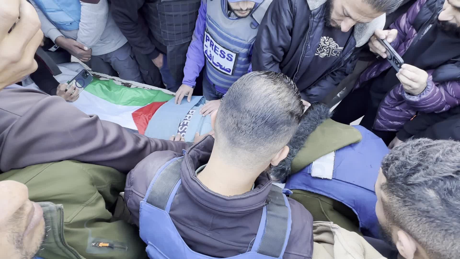 Mourners Gather at Funeral of Al Jazeera Journalist Ahmed Al-Louh in Gaza