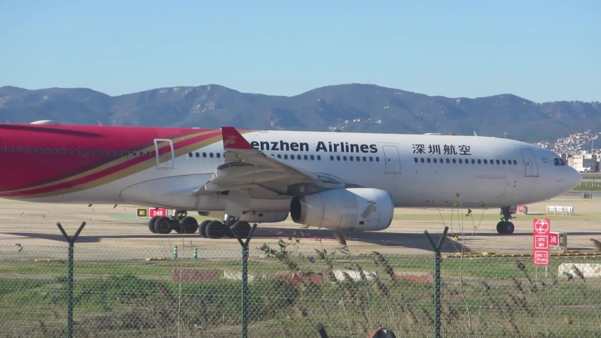 Shenzhen Airlines Airbus A330 starting takeoff maneuvers at Barcelona airport