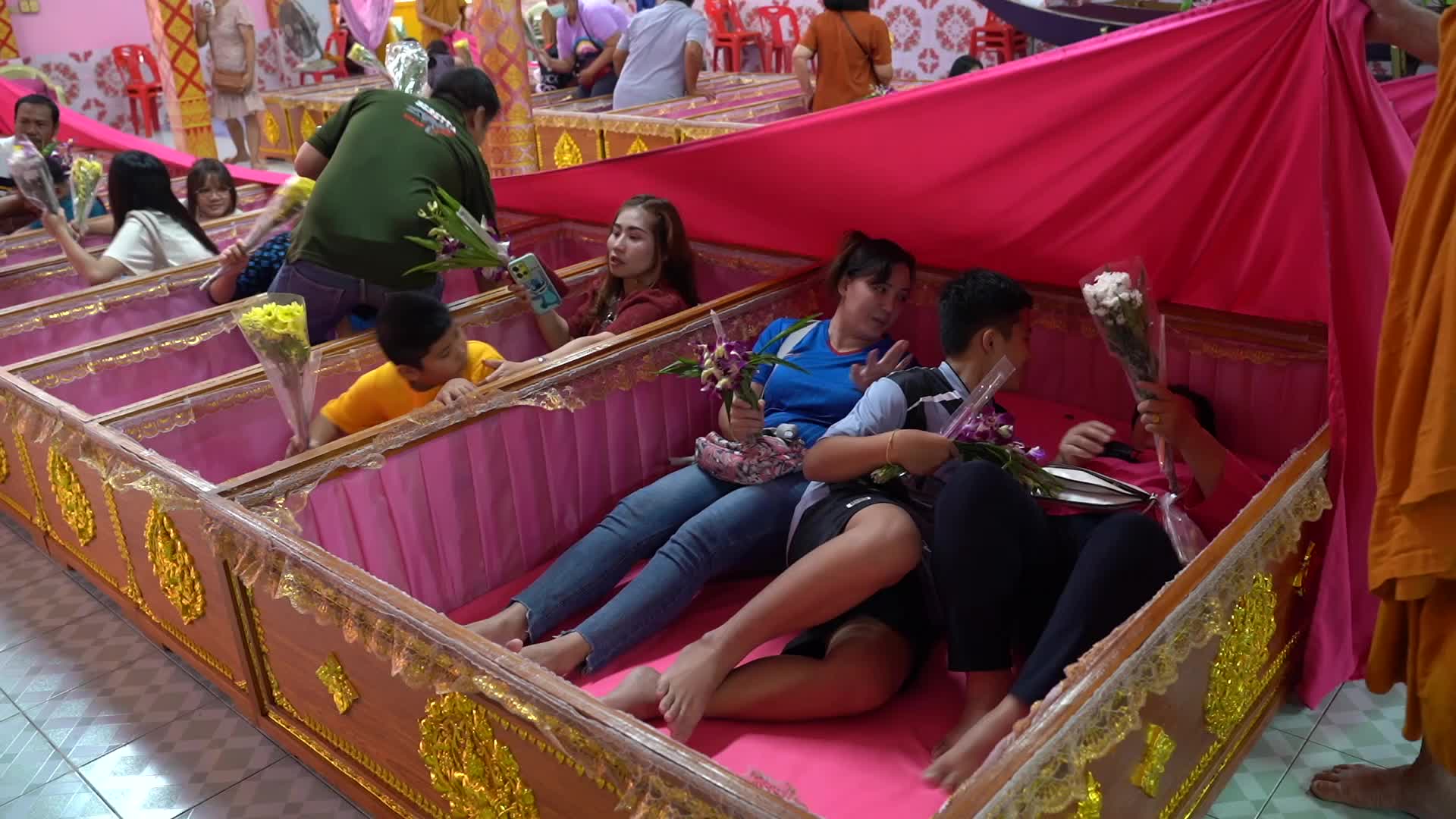 Thai People Lie In Coffins To Welcome The New Year.