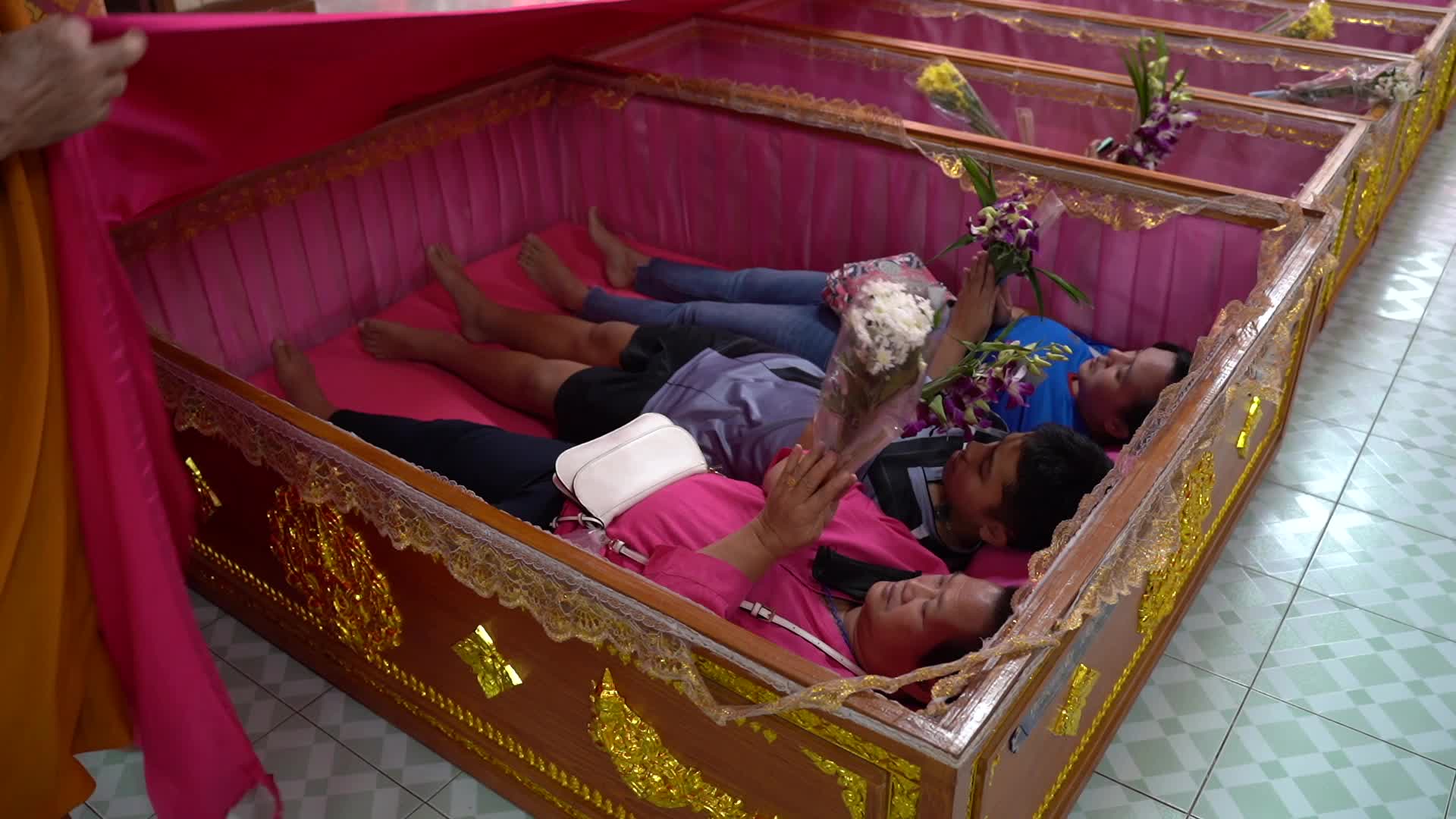 Thai People Lie In Coffins To Welcome The New Year.