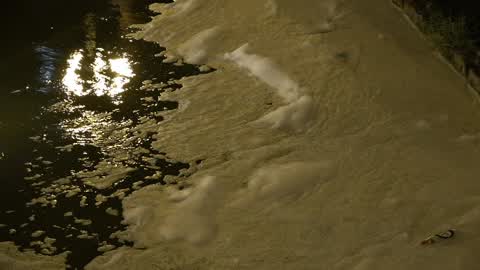 About two thousand people spill soap in the Plaza España in Barcelona