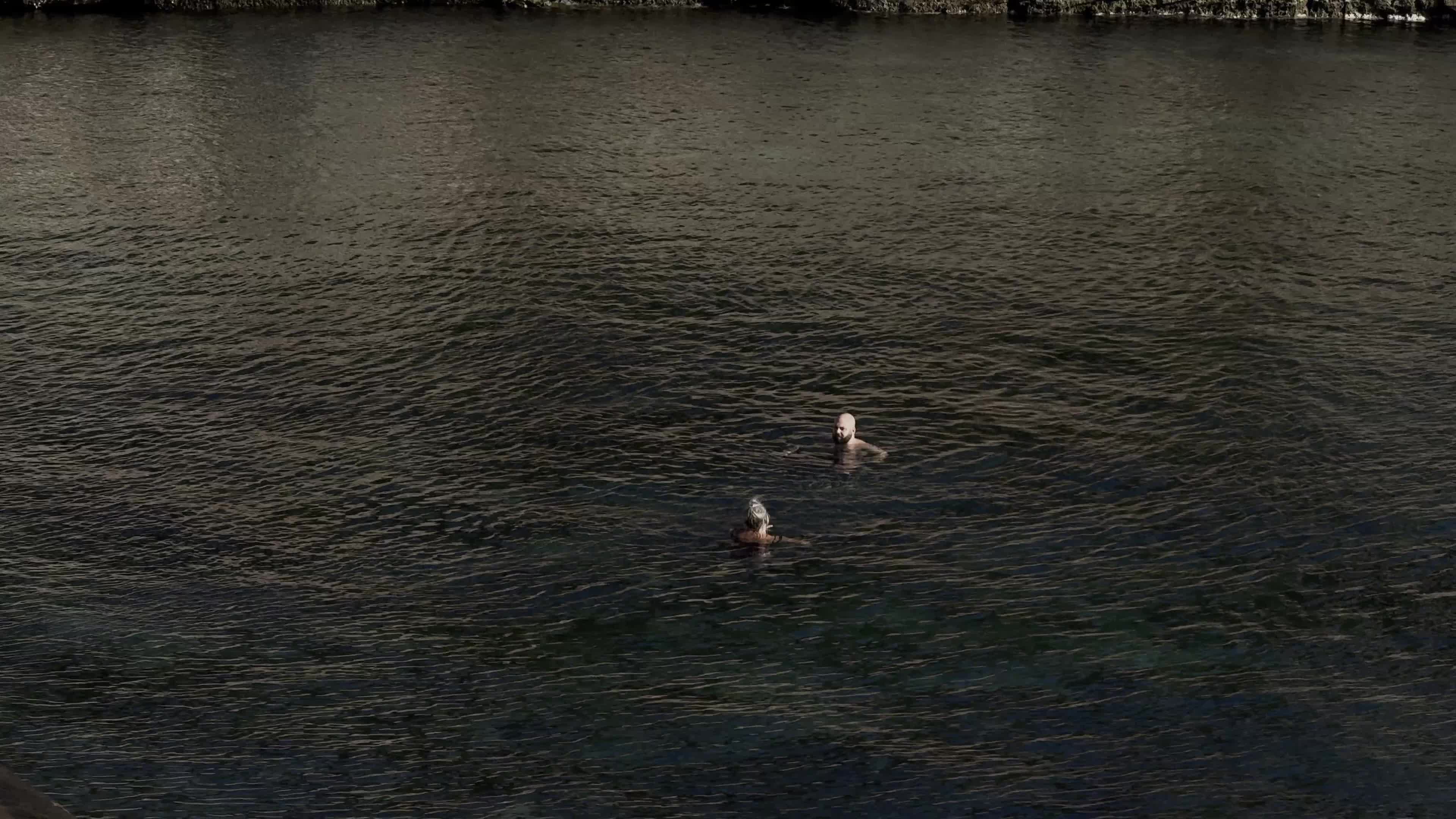 Swimmers Enjoy the Sea in Tricase Porto Amid Mild Winter Weather