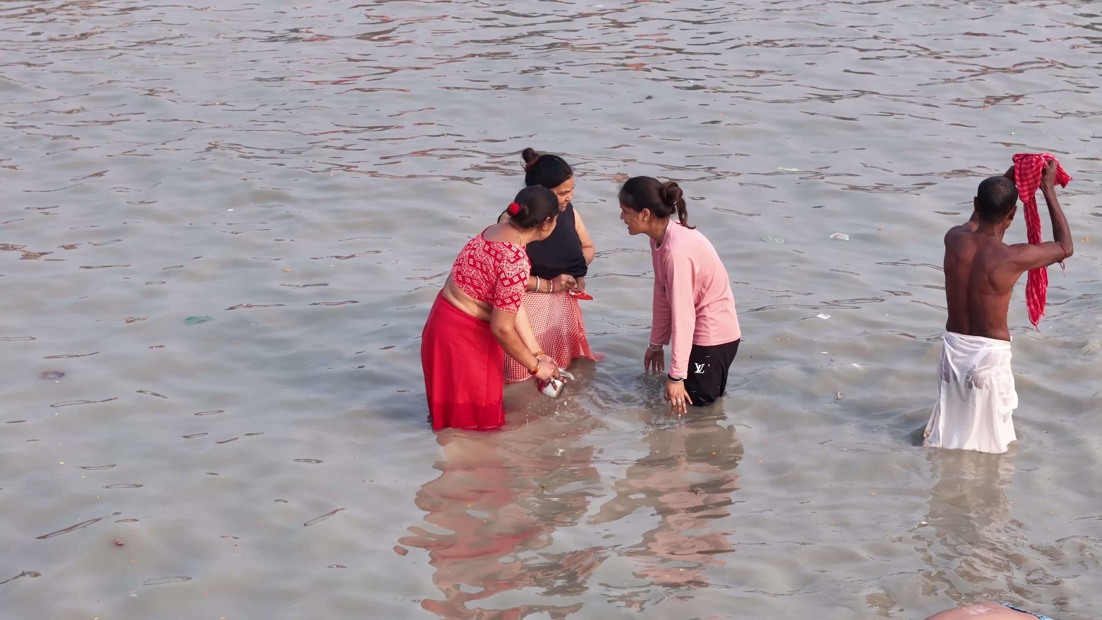Hindu Pilgrims Taking Holy Dip at Gangasagar Island During Annual Gangasagar Mela