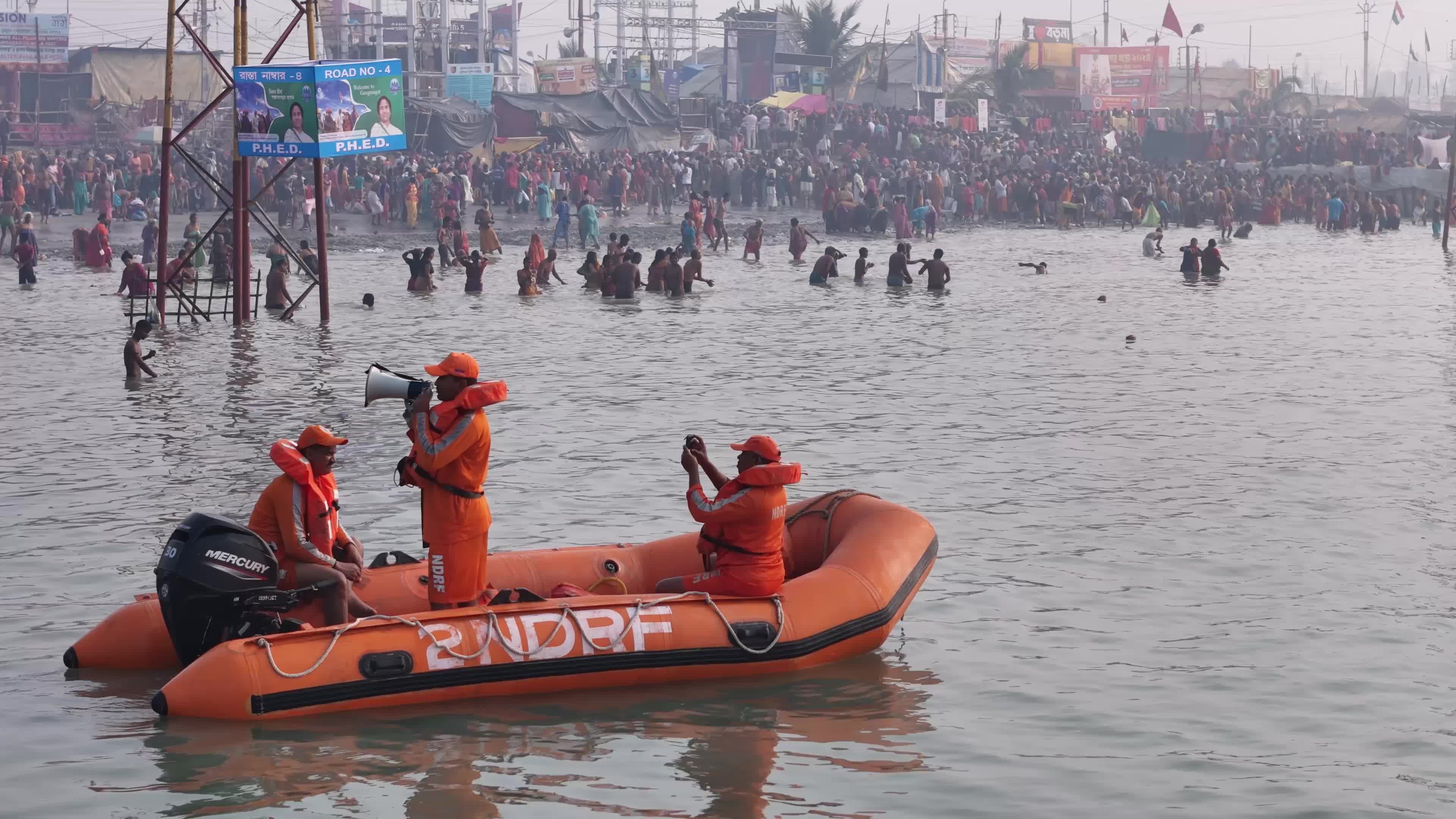Hindu Pilgrims Taking Holy Dip at Gangasagar Island During Annual Gangasagar Mela