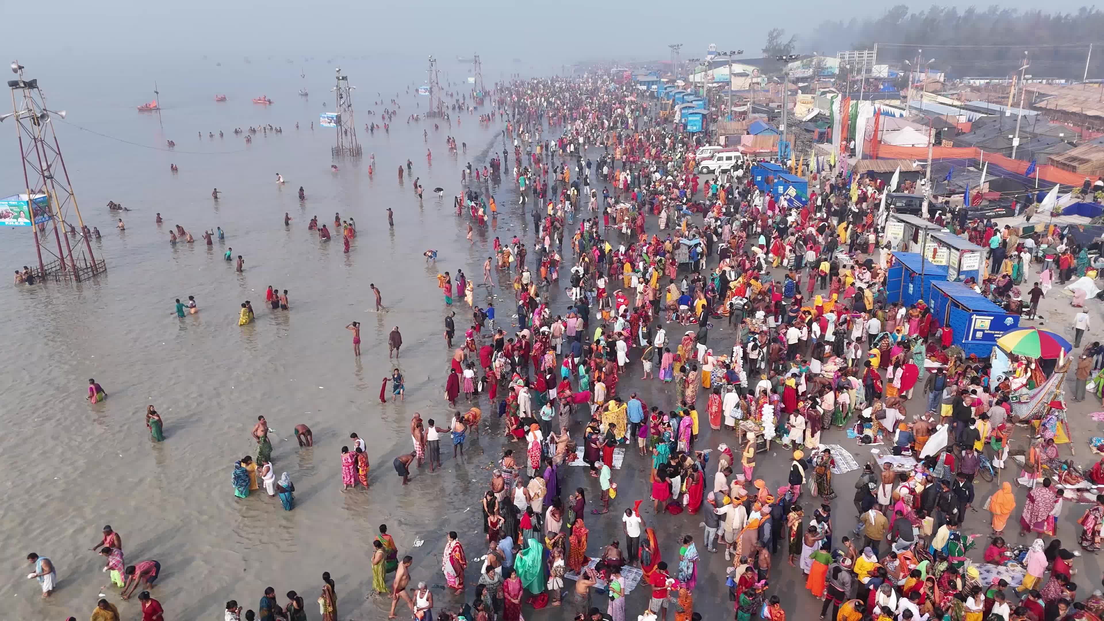 Hindu Pilgrims Taking Holy Dip at Gangasagar Island During Annual Gangasagar Mela