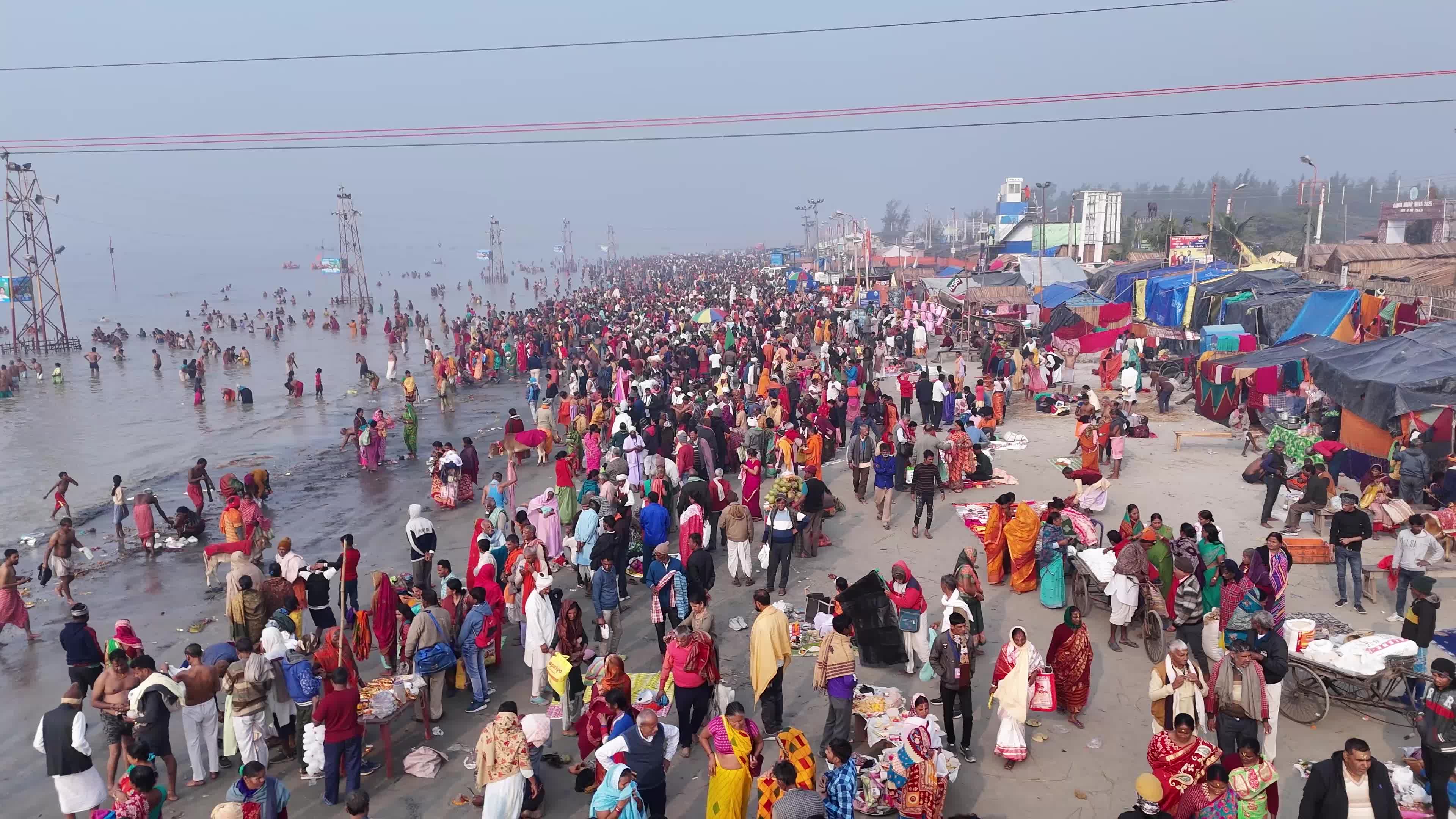 Hindu Pilgrims Taking Holy Dip at Gangasagar Island During Annual Gangasagar Mela