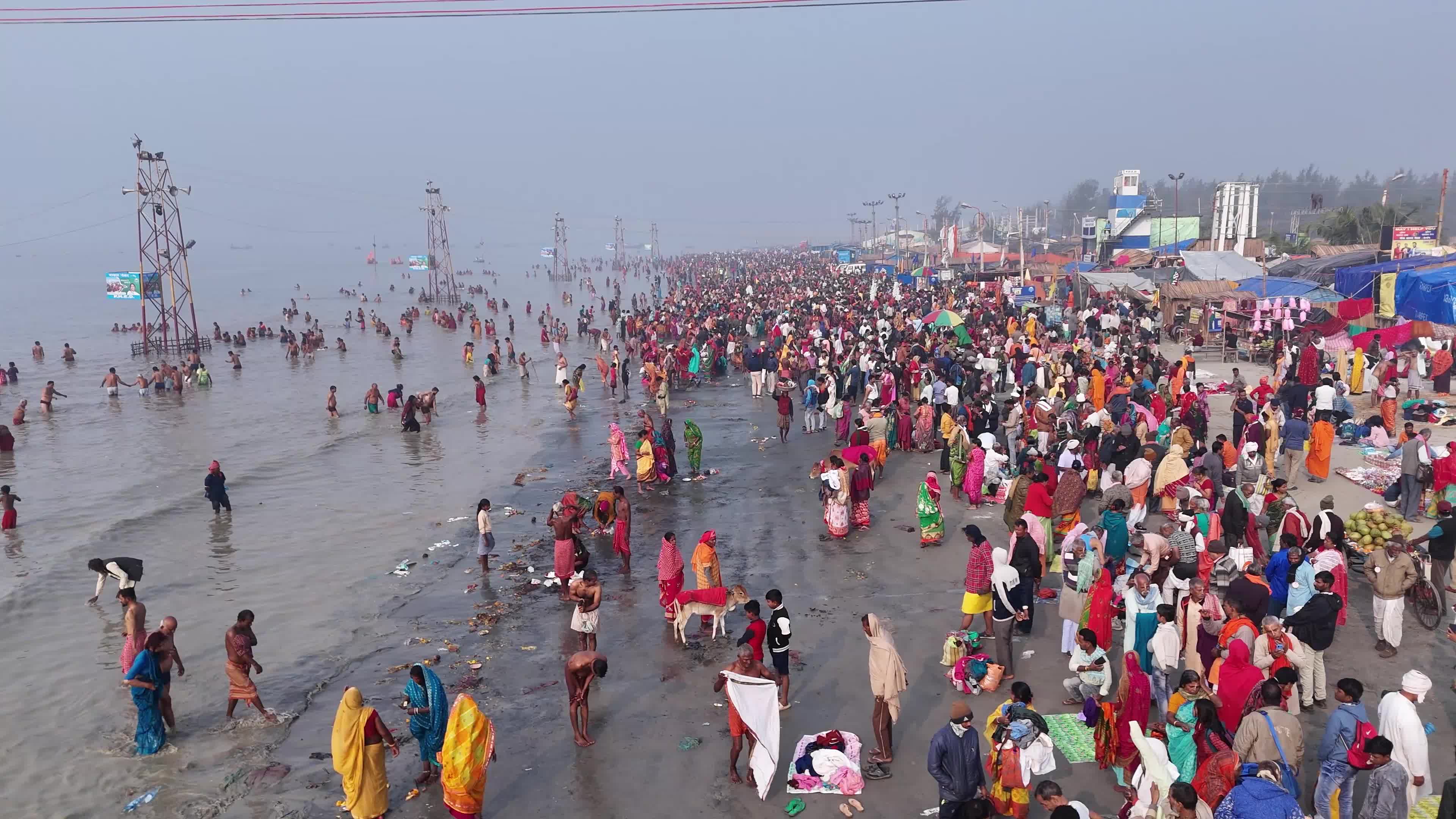 Hindu Pilgrims Taking Holy Dip at Gangasagar Island During Annual Gangasagar Mela