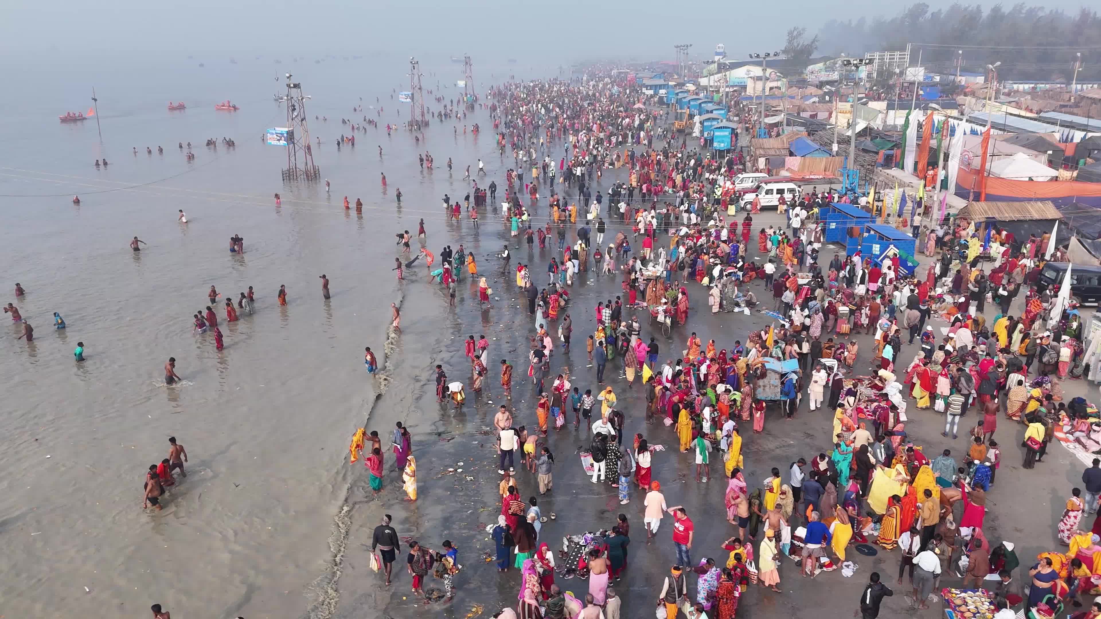 Hindu Pilgrims Taking Holy Dip at Gangasagar Island During Annual Gangasagar Mela