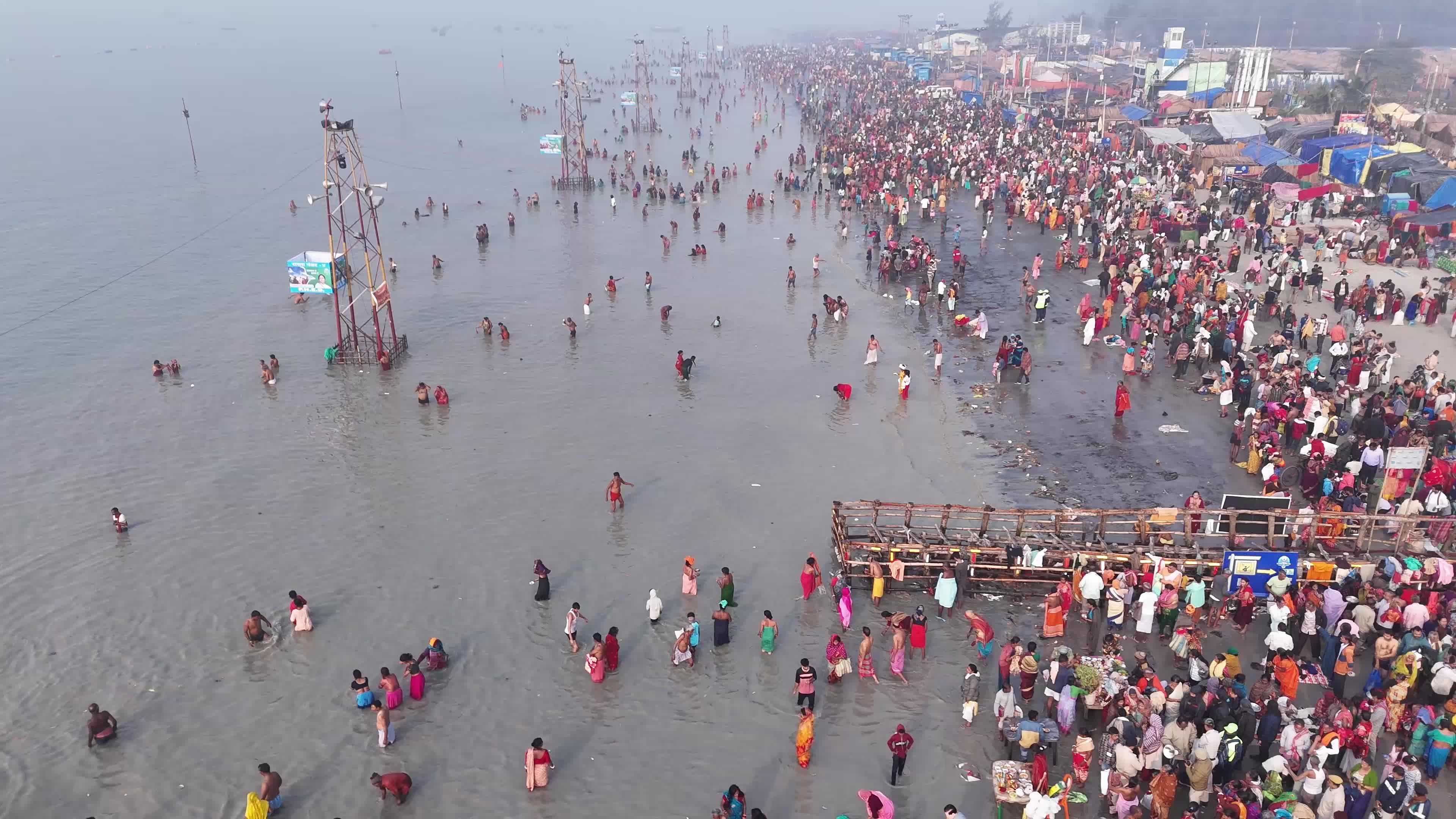 Hindu Pilgrims Taking Holy Dip at Gangasagar Island During Annual Gangasagar Mela