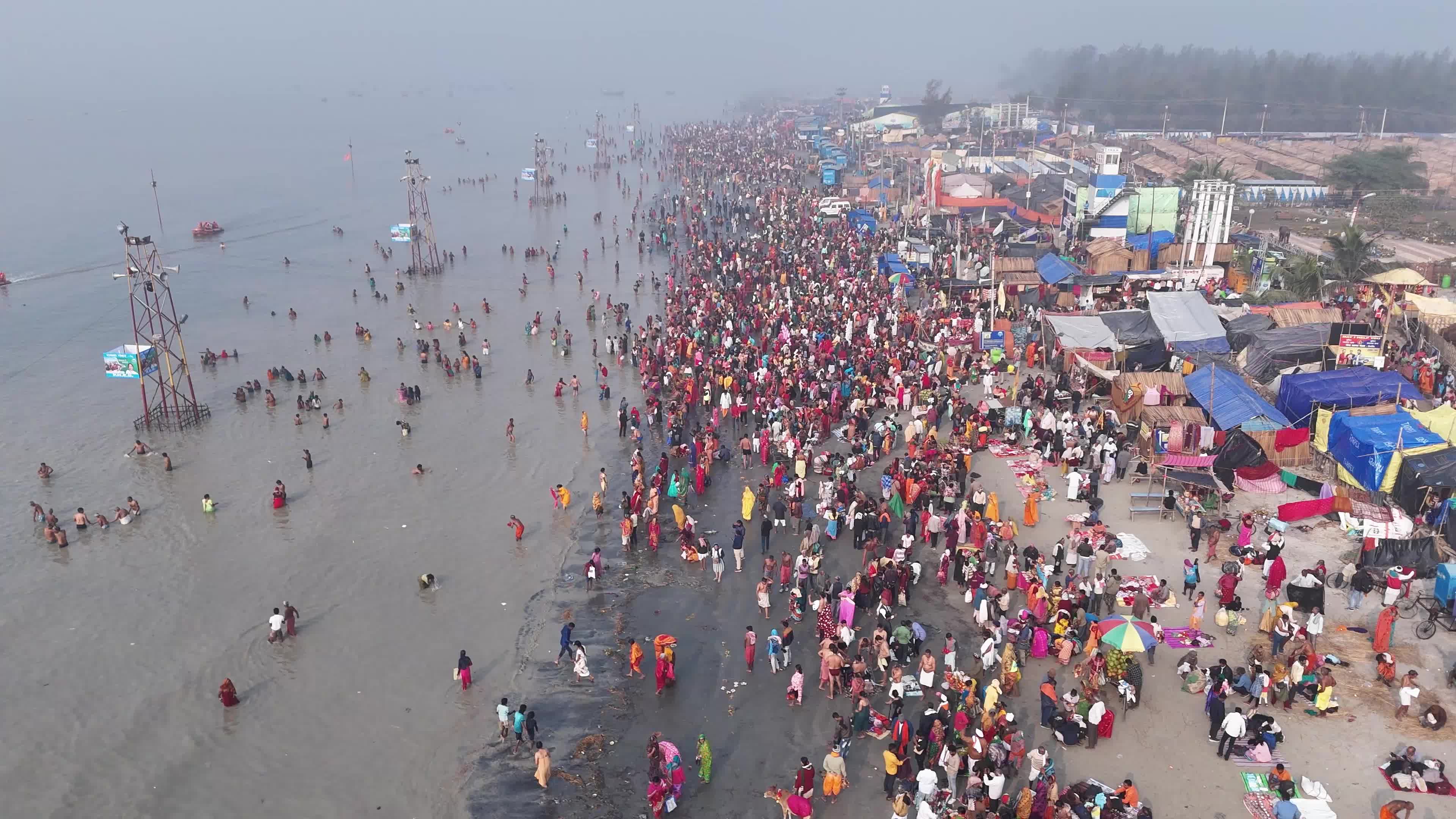 Hindu Pilgrims Taking Holy Dip at Gangasagar Island During Annual Gangasagar Mela