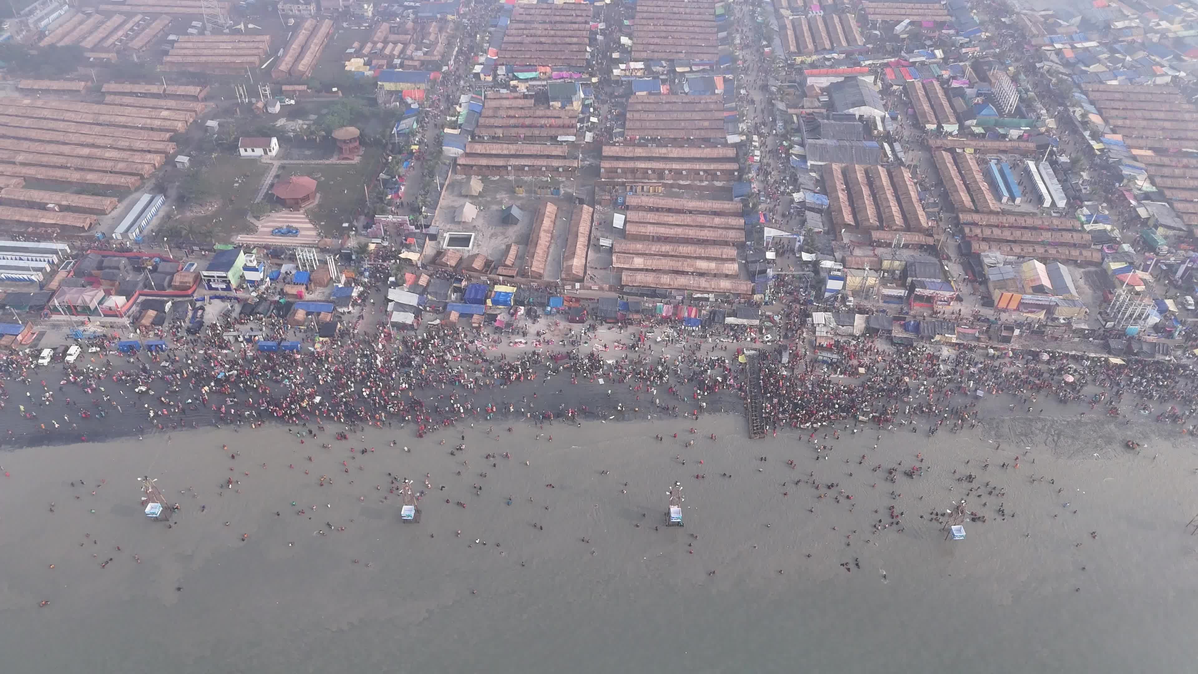 Hindu Pilgrims Taking Holy Dip at Gangasagar Island During Annual Gangasagar Mela